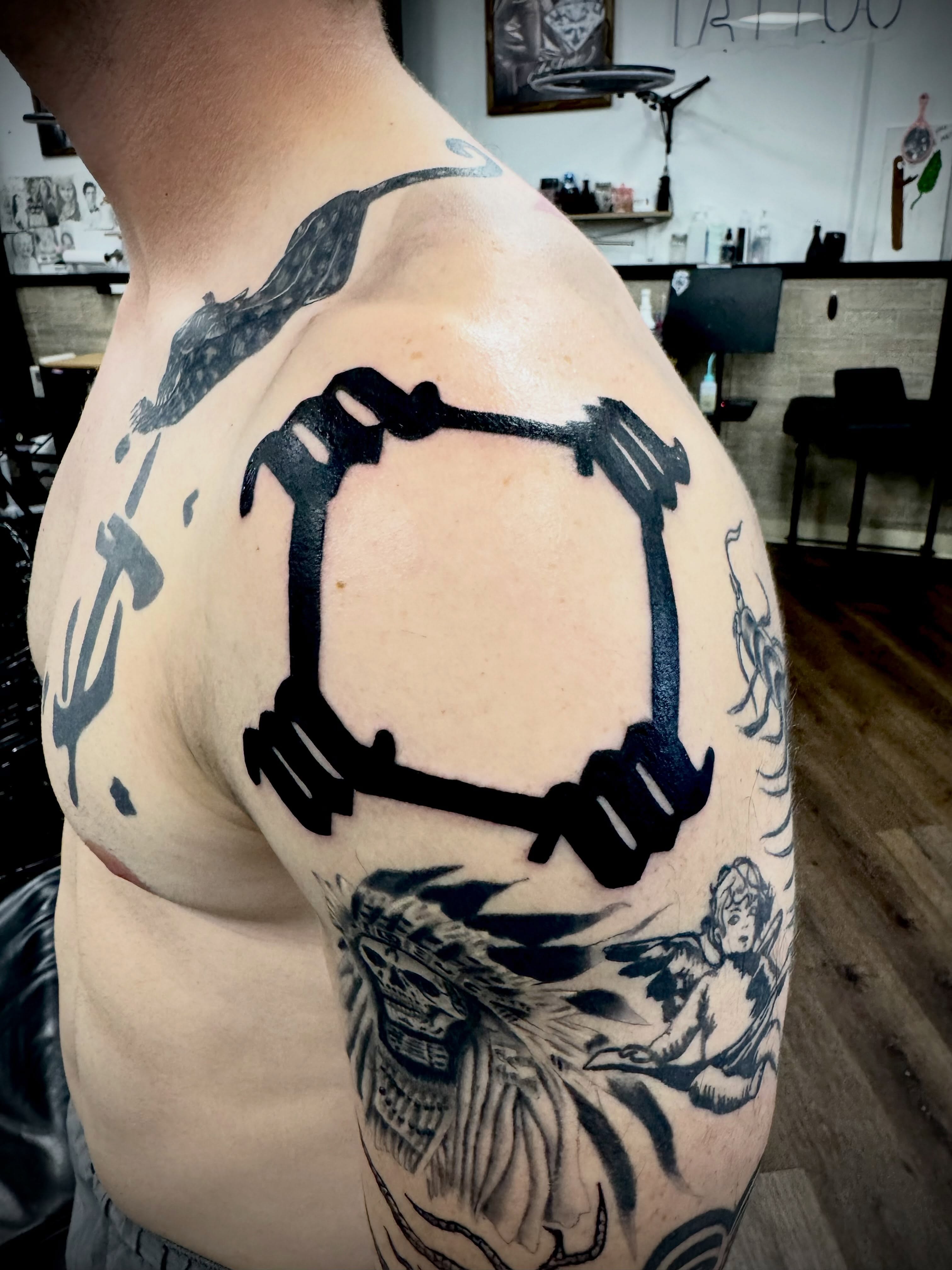 Cuff black and grey tattoo on the shoulder by LeLe