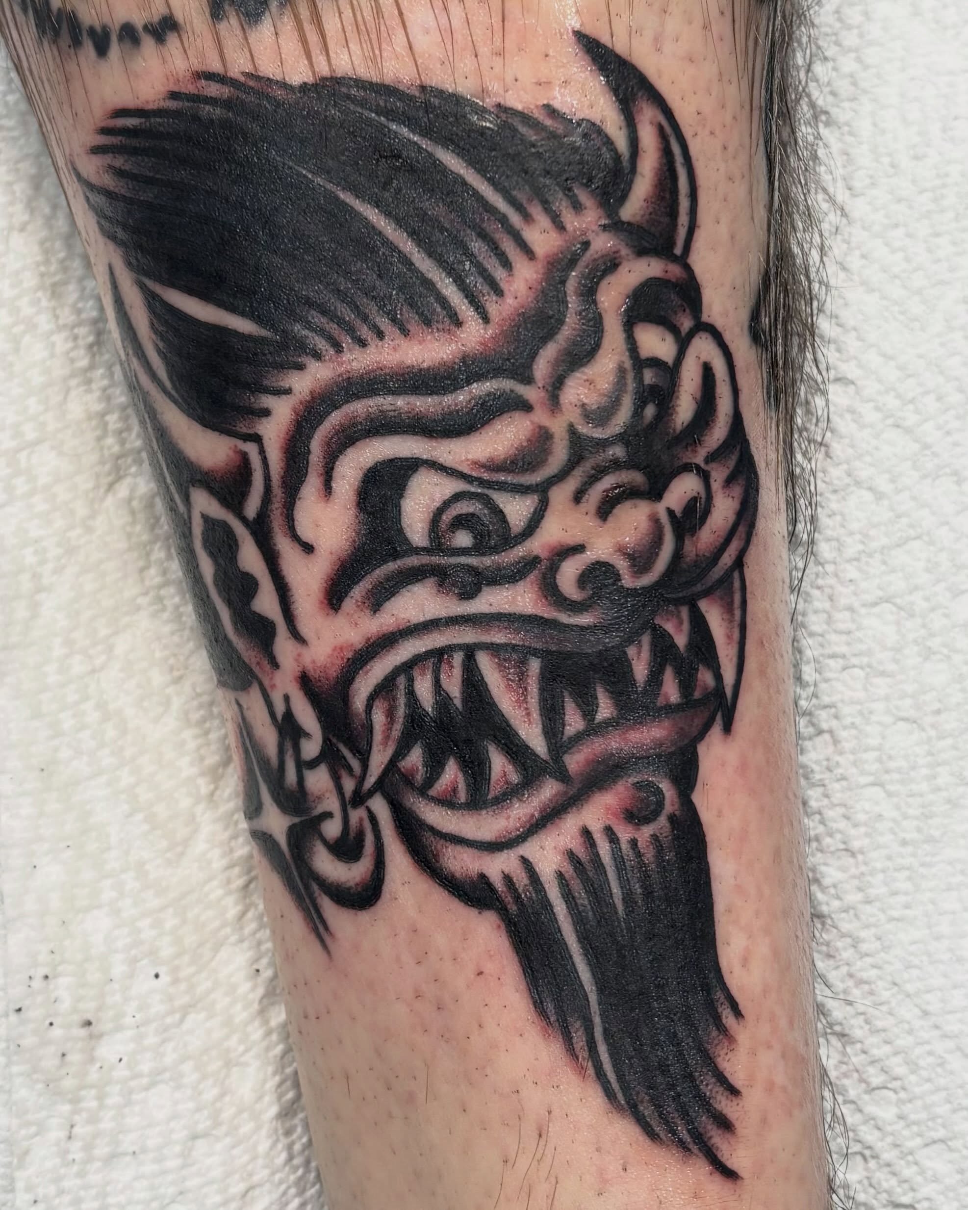 Demon head japanese irezumi tattoo on the forearm by Tia Cave