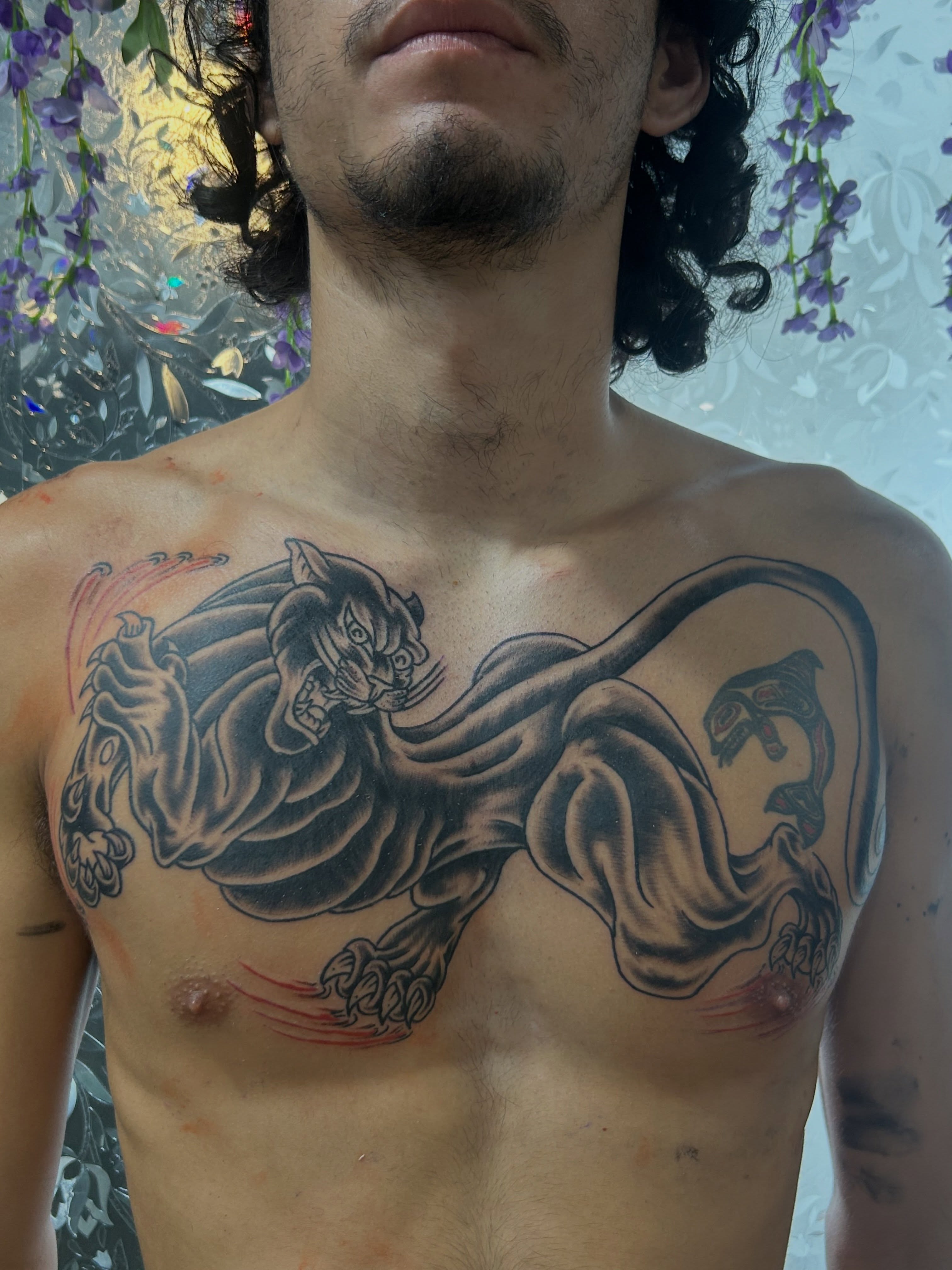 Panther black and grey tattoo on the chest by キノ 🦊
