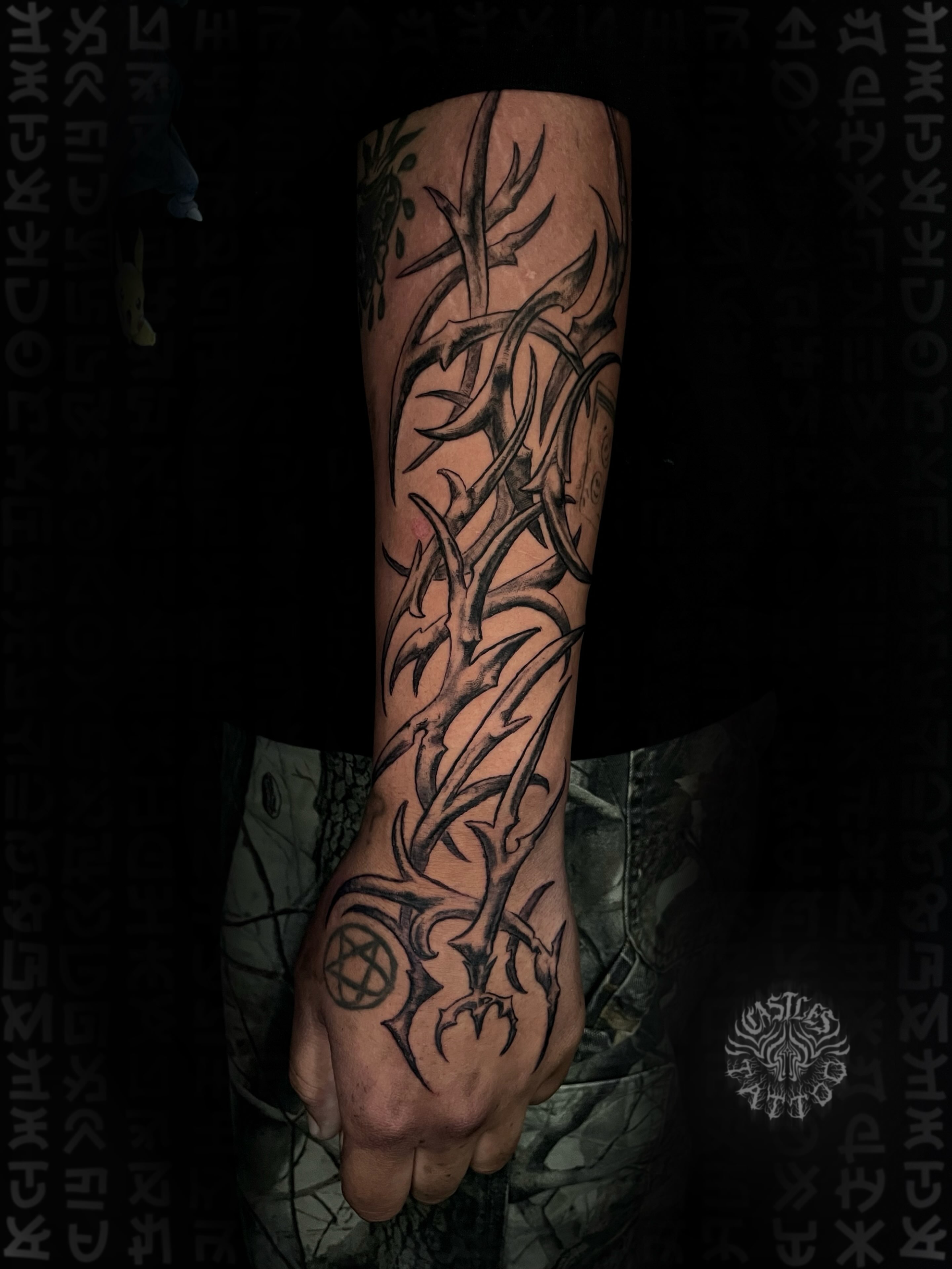 Antlers tribal tattoo on the forearm by Erin Portland Tattoo Artist