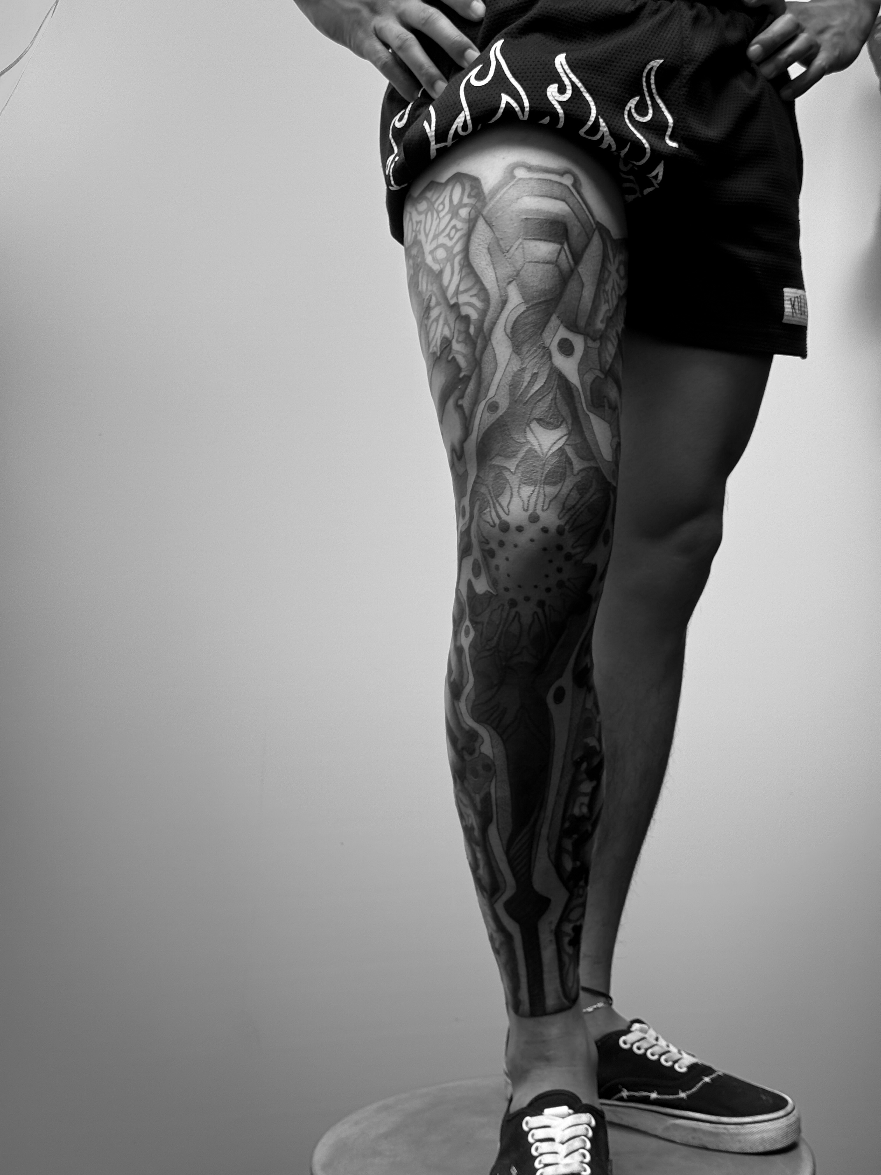 Abstract geometric pattern geometric tattoo on the leg by Josaline Green