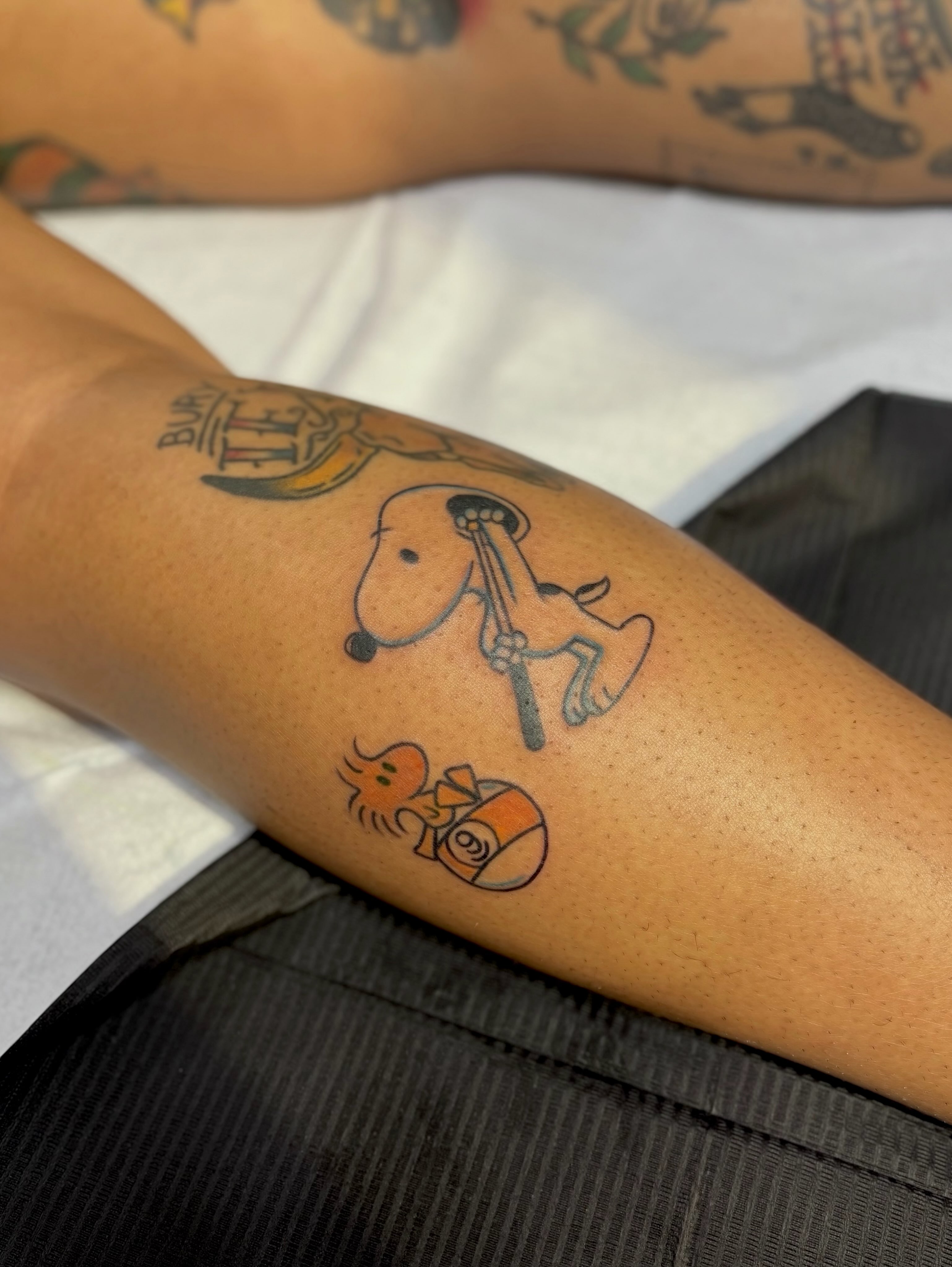 Snoopy black and grey tattoo on the forearm by Danelle ✶ Nashville Tattooer