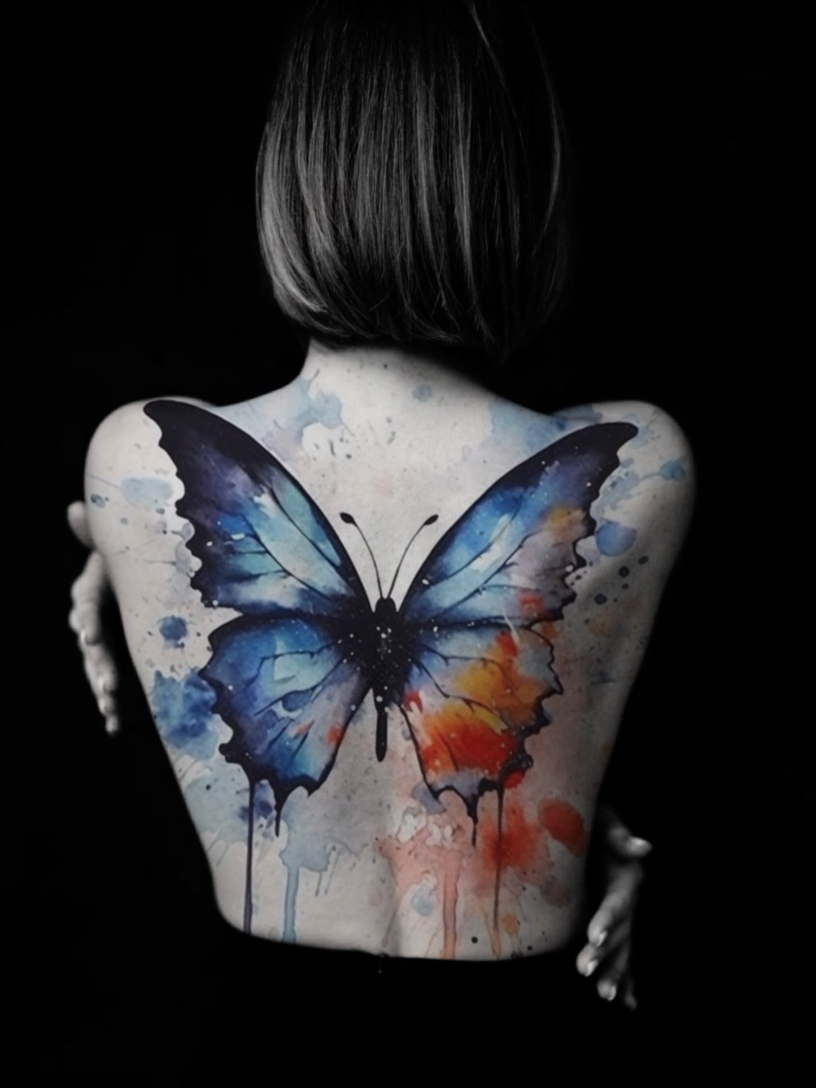 Butterfly watercolor tattoo on the back by jonhighland