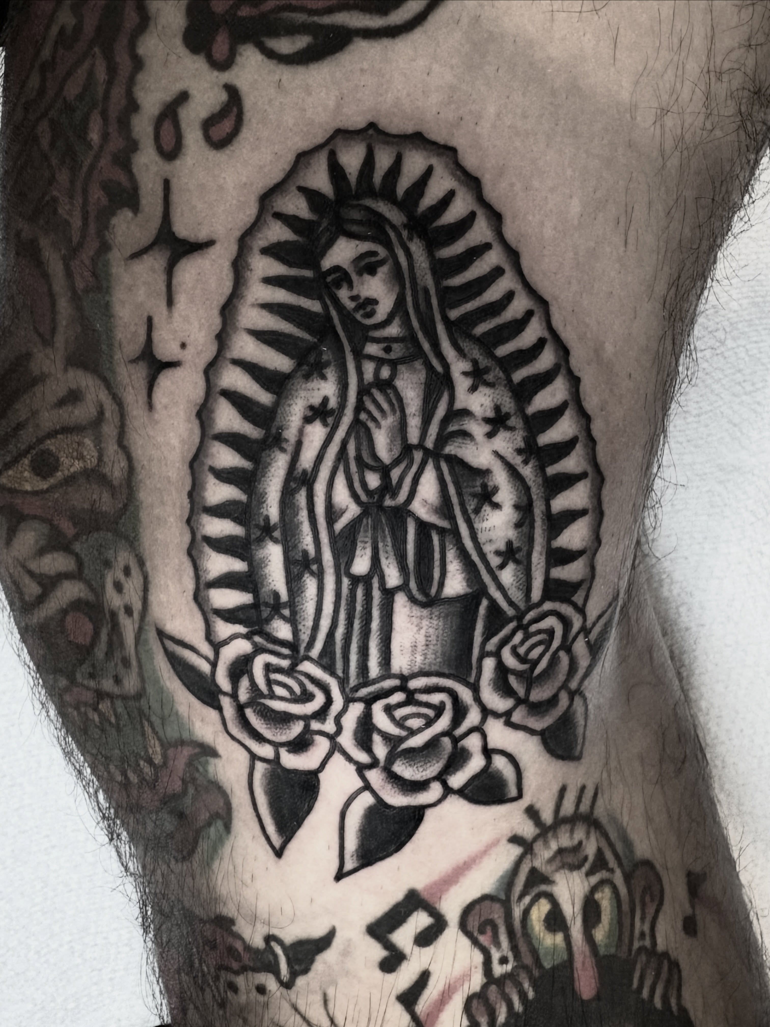 Our Lady of Guadalupe American traditional tattoo on the forearm by π³πππ πΆπππππ