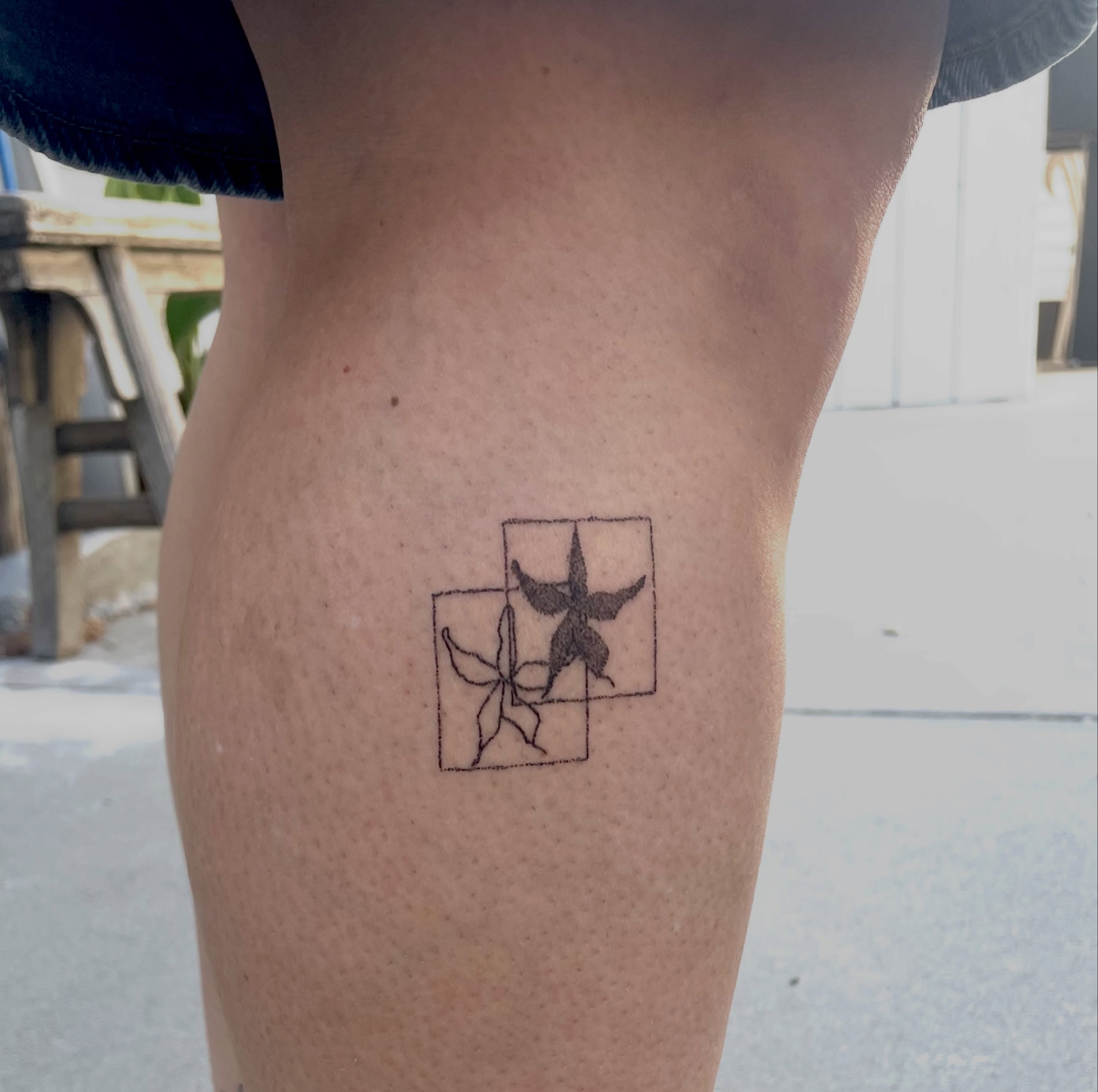 Starfish geometric tattoo on the thigh by Alyssa