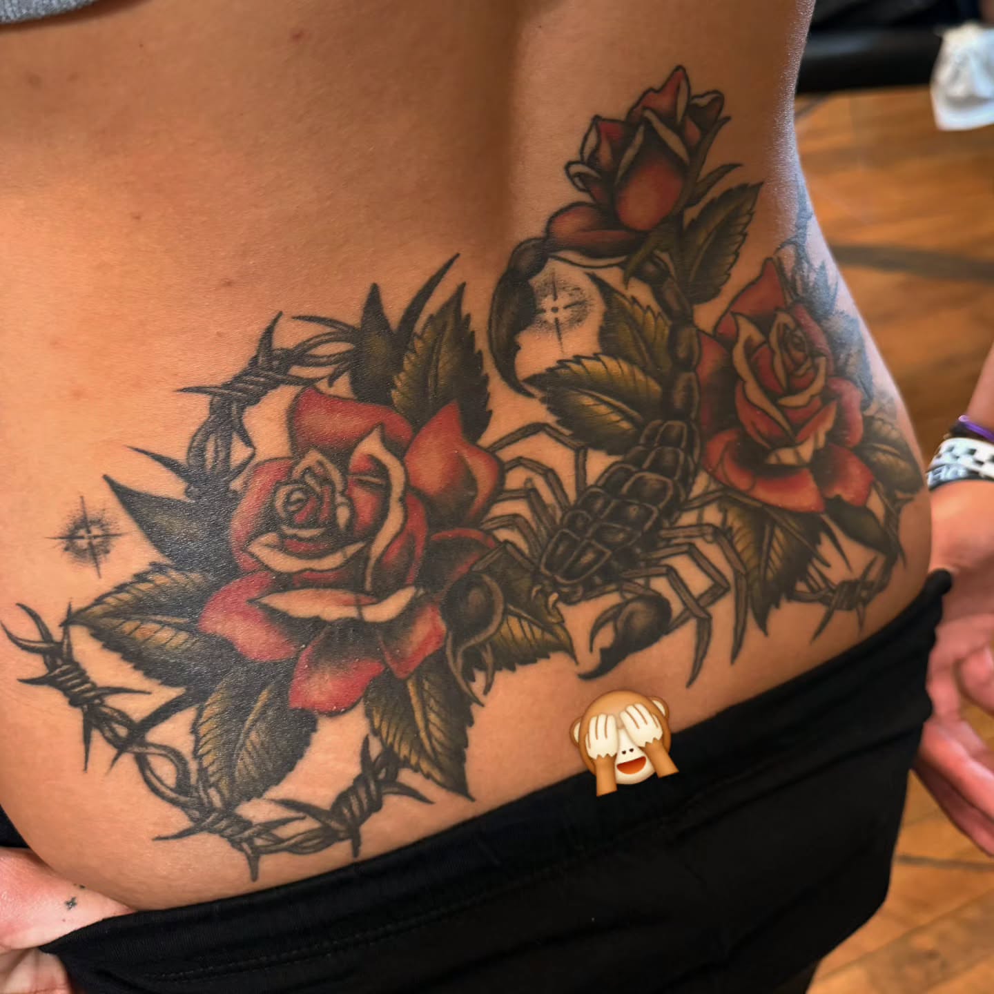 Roses and scorpion American traditional tattoo on the ribs by Kat McCoy Guidera, Nashville, Tennessee