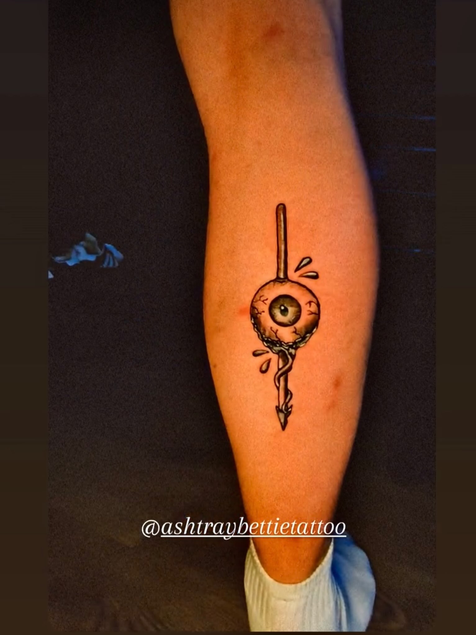 Eye with arrow realism tattoo on the forearm by Resse