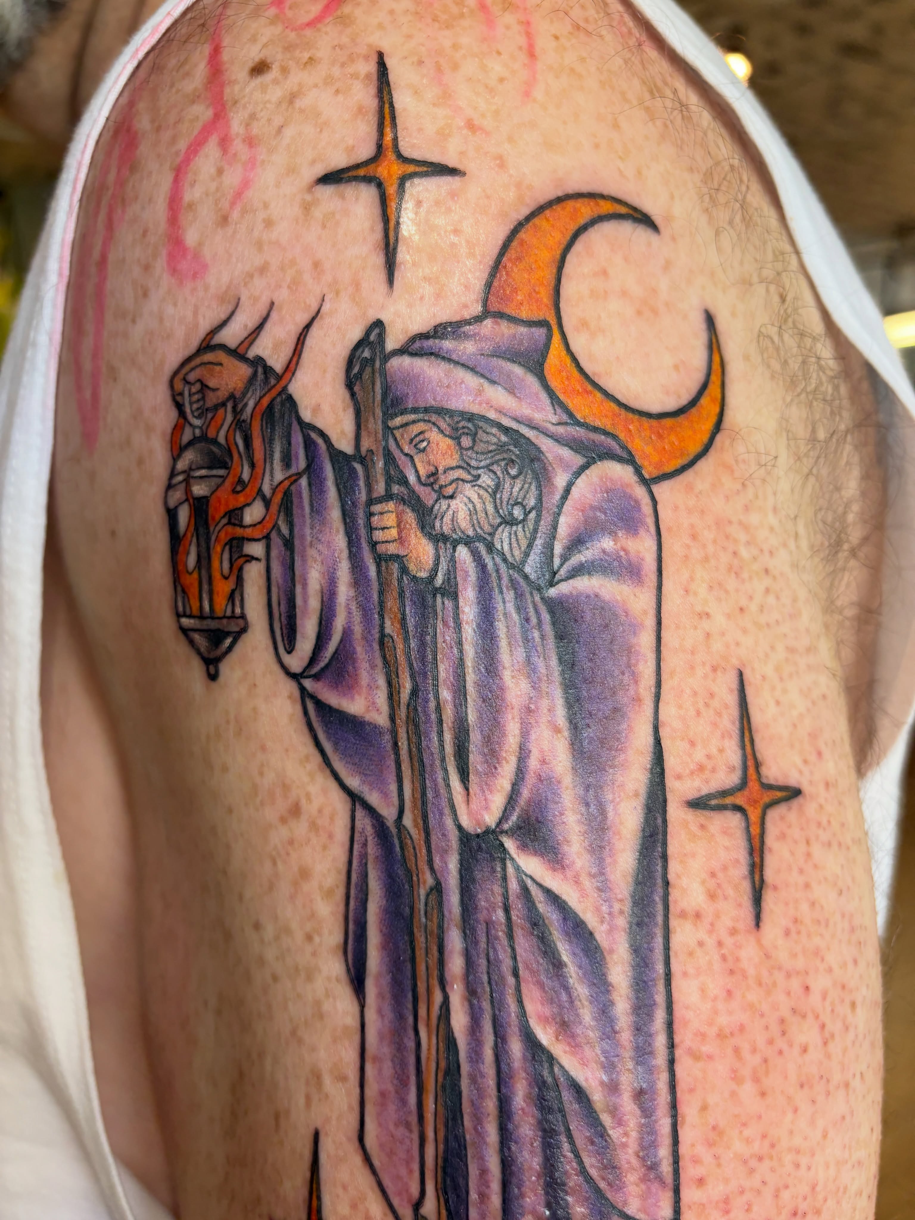 Wizard with lantern illustrative tattoo on the shoulder by Kimber Teatro, Portland, Oregon