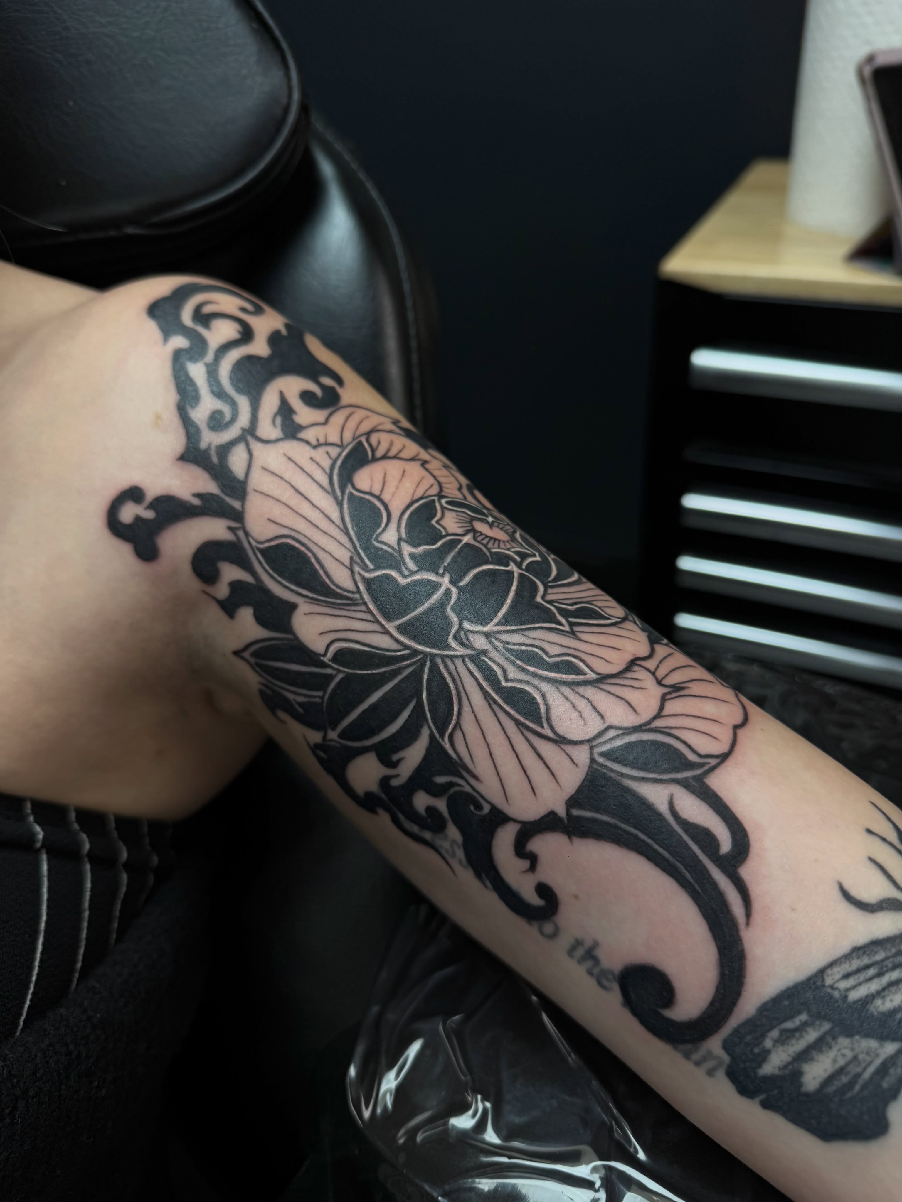 Lotus flower American traditional tattoo on the forearm by “tatsbysabby”