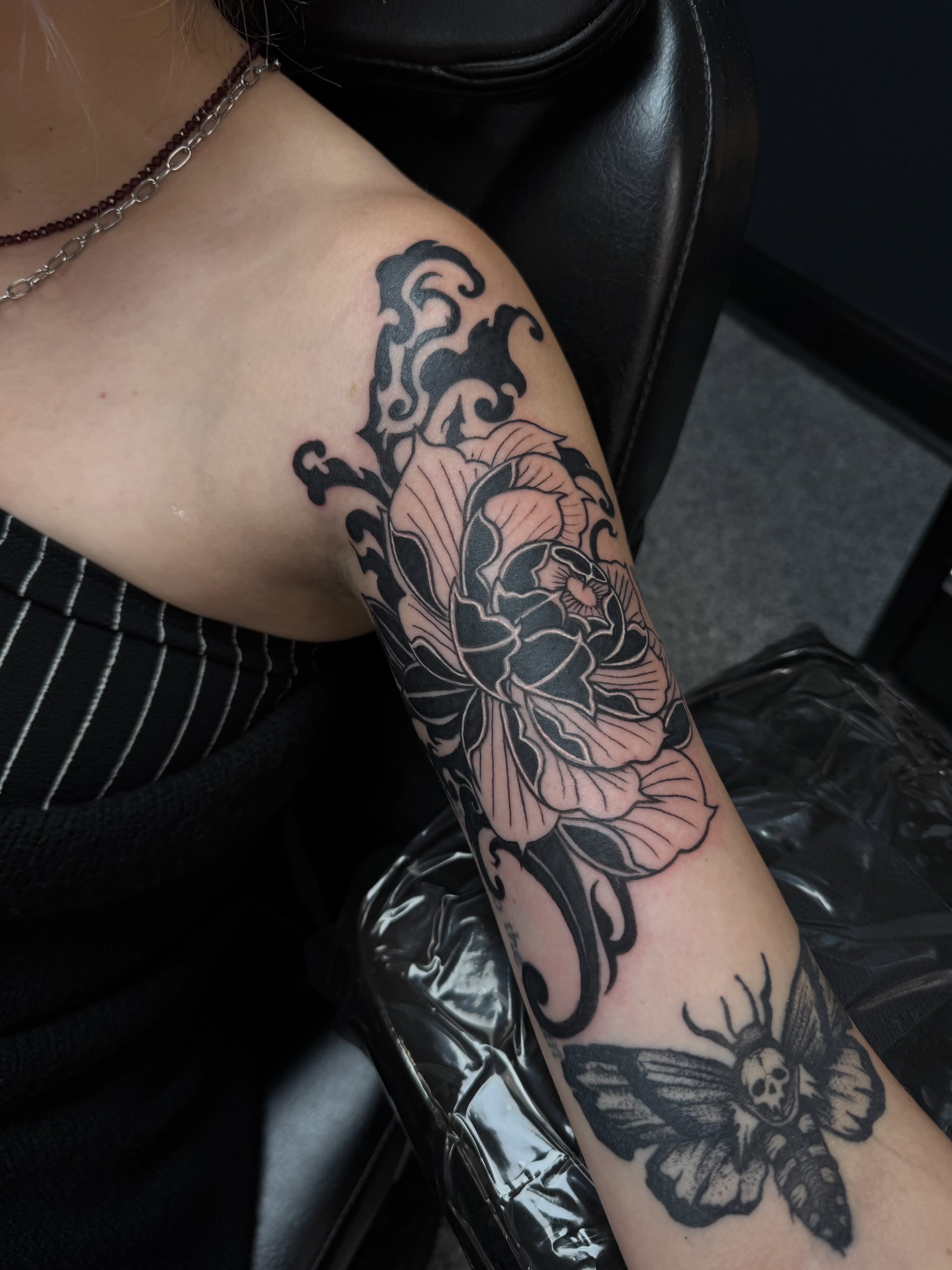 Tattoo by @pushingpigment1117 — black_and_grey, ornamental