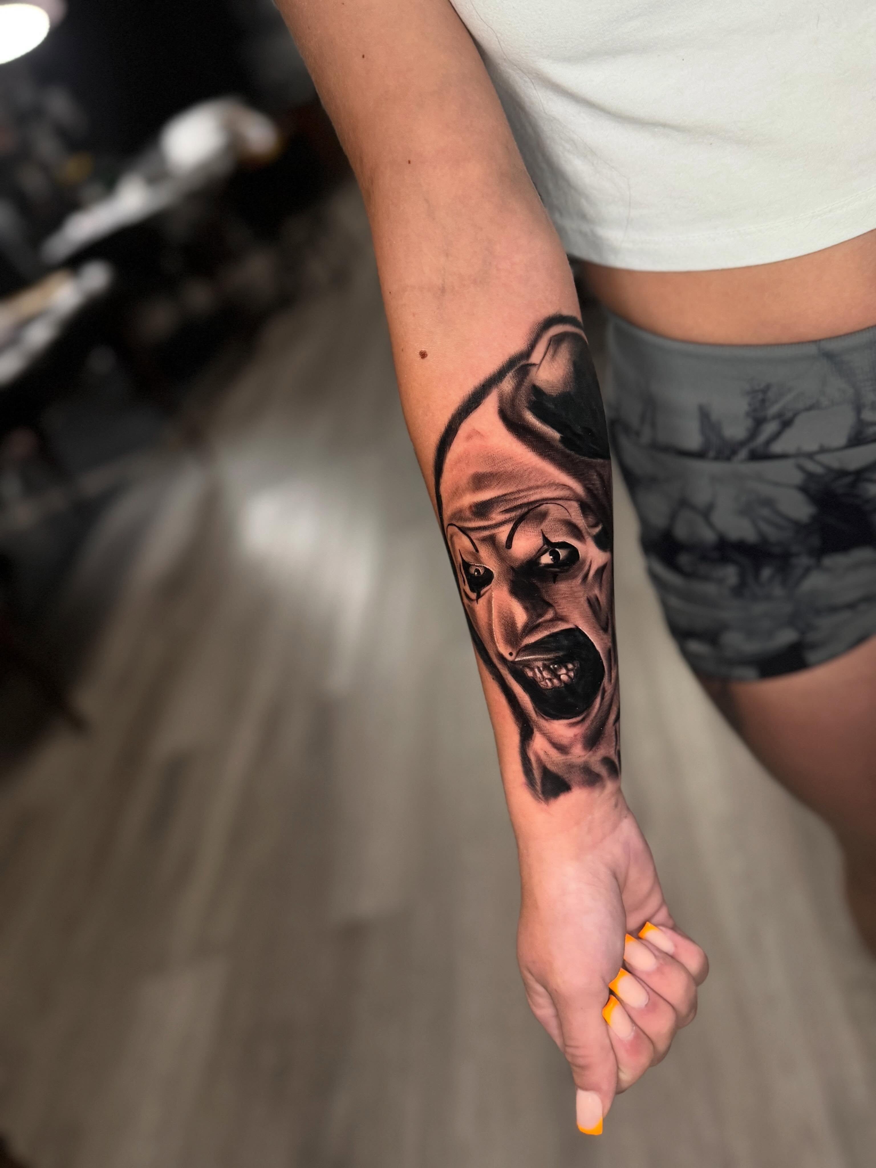 Scream realism tattoo on the forearm by Adrián Banuelos