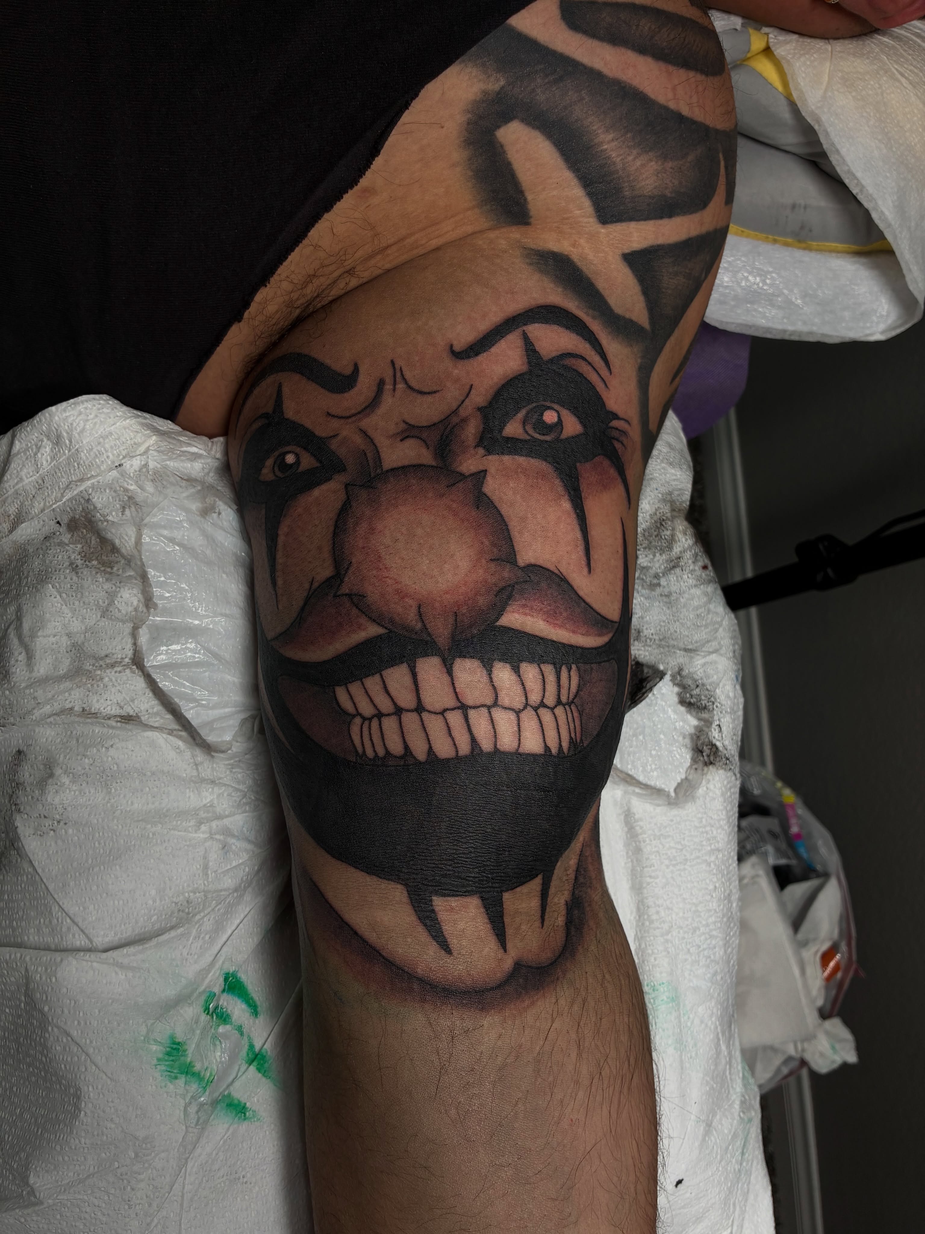 Clown face realism tattoo on the forearm by Nessa, Las Vegas, Nevada