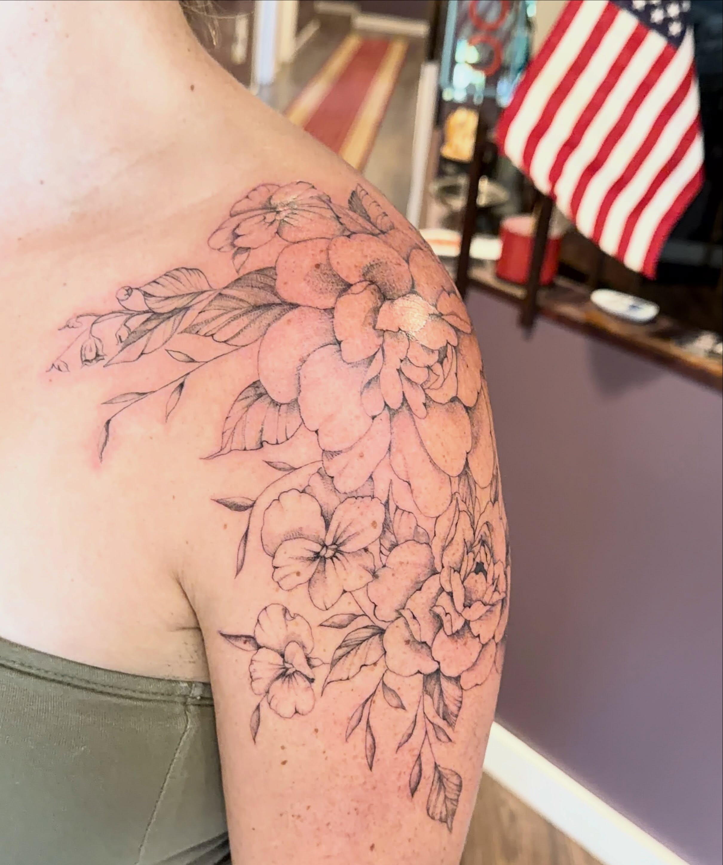 Flowers black and grey tattoo on the shoulder by Elizabeth (Lib), Murfreesboro, Tennessee