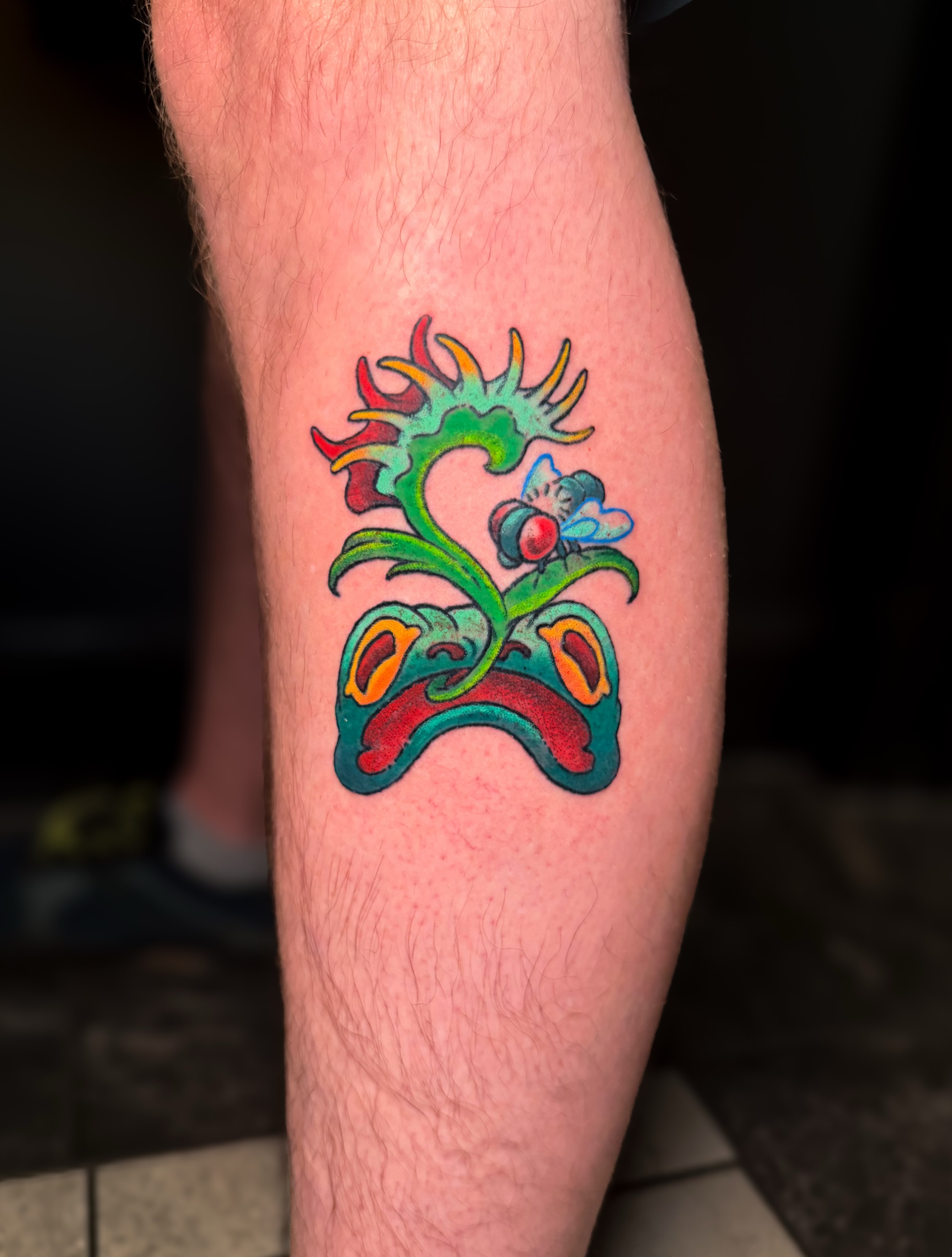 Floral design new school tattoo on the forearm by Ivy-Jade Edwards, Memphis, Tennessee