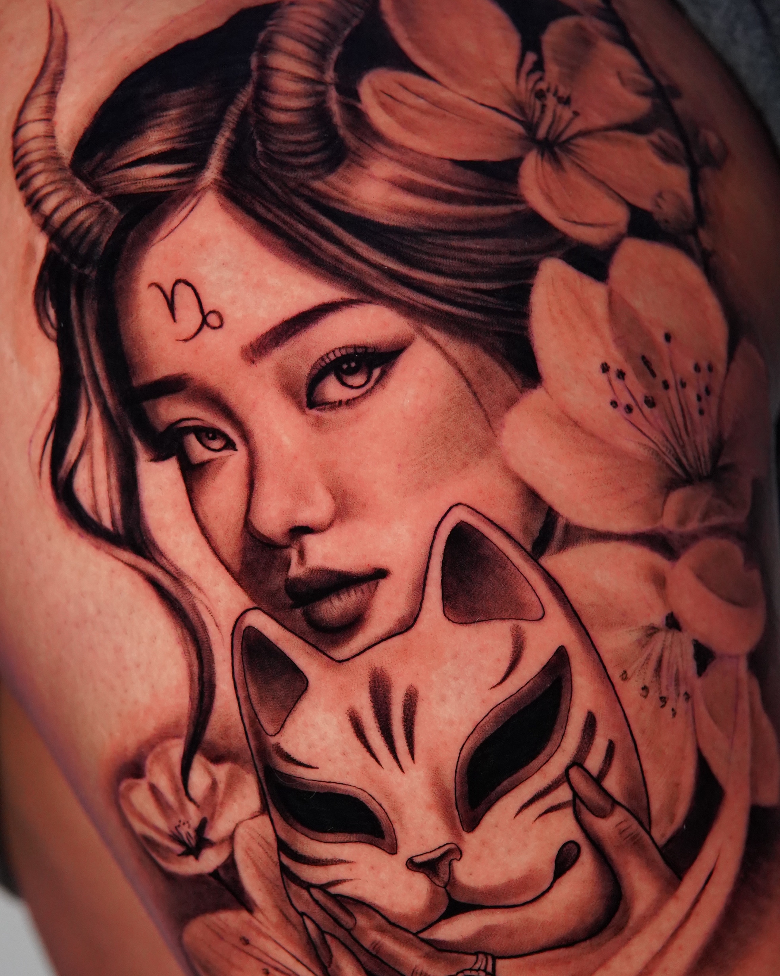 Woman with cat realism tattoo on the shoulder by Marissa S., Lansing, Michigan