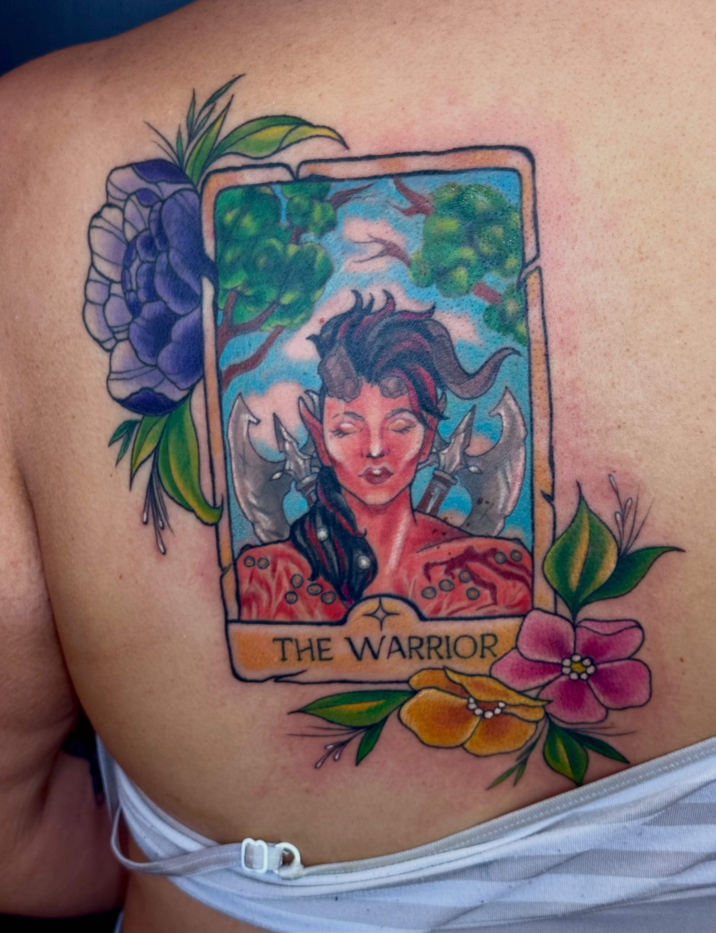 Warrior American traditional tattoo on the back by Caitlynn Austin