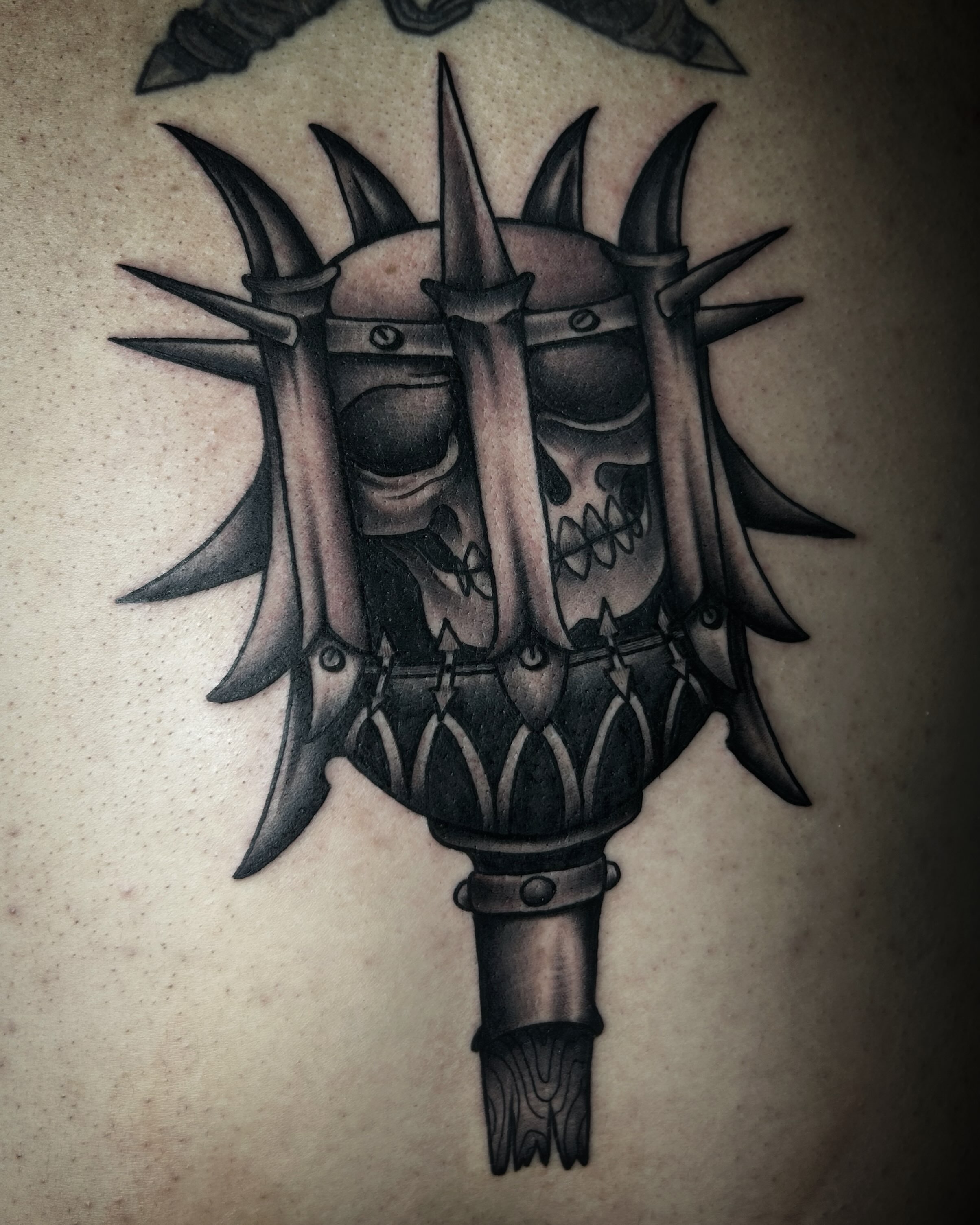 Skull helmet black and grey tattoo by Samantha C, Bremerton, Washington
