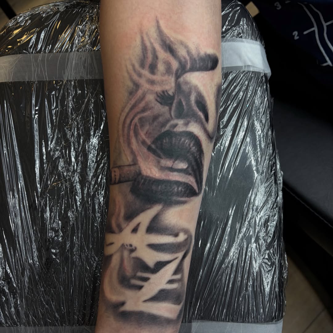 Smoking woman realism tattoo on the forearm by Haley