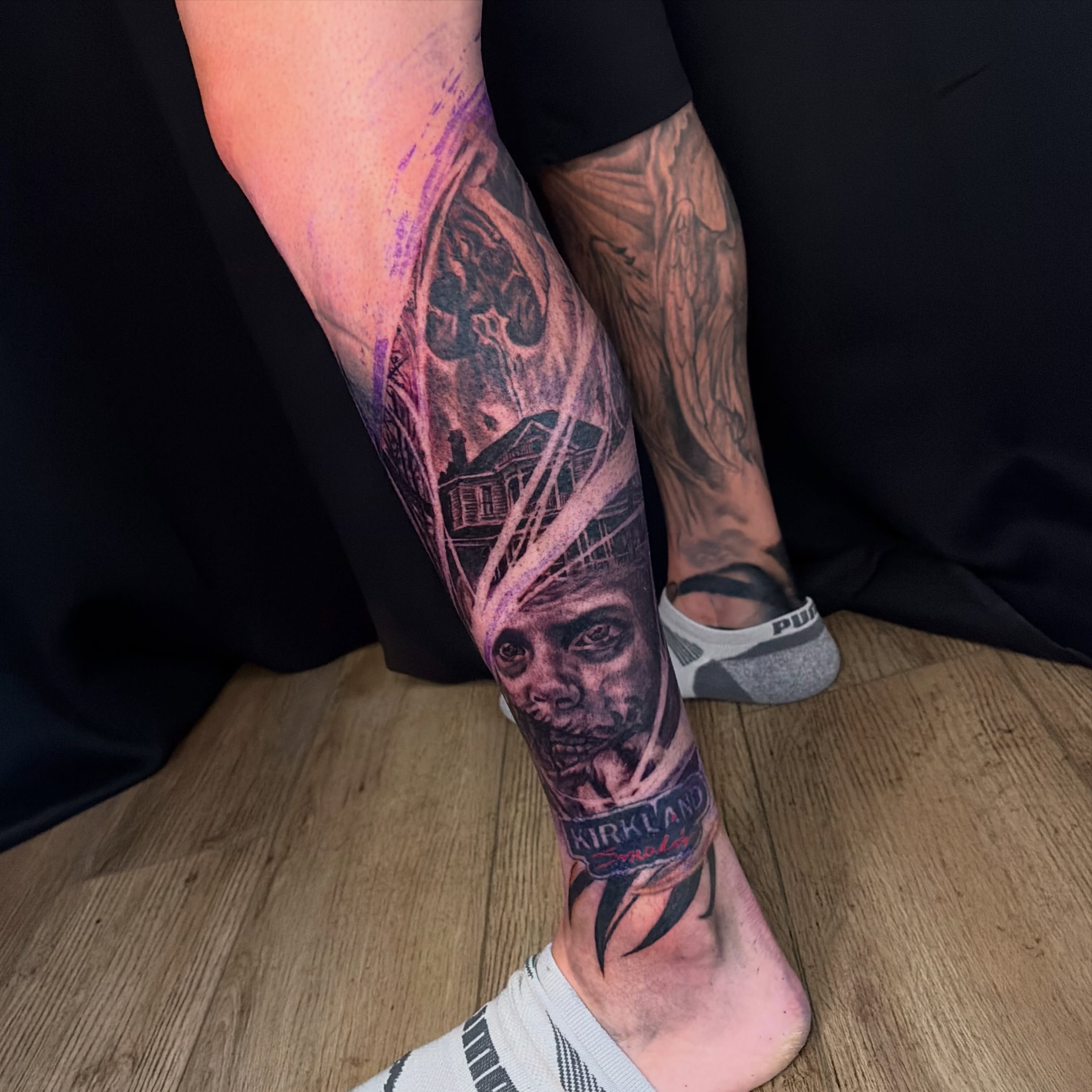 House and woman realism tattoo on the calf by Haley
