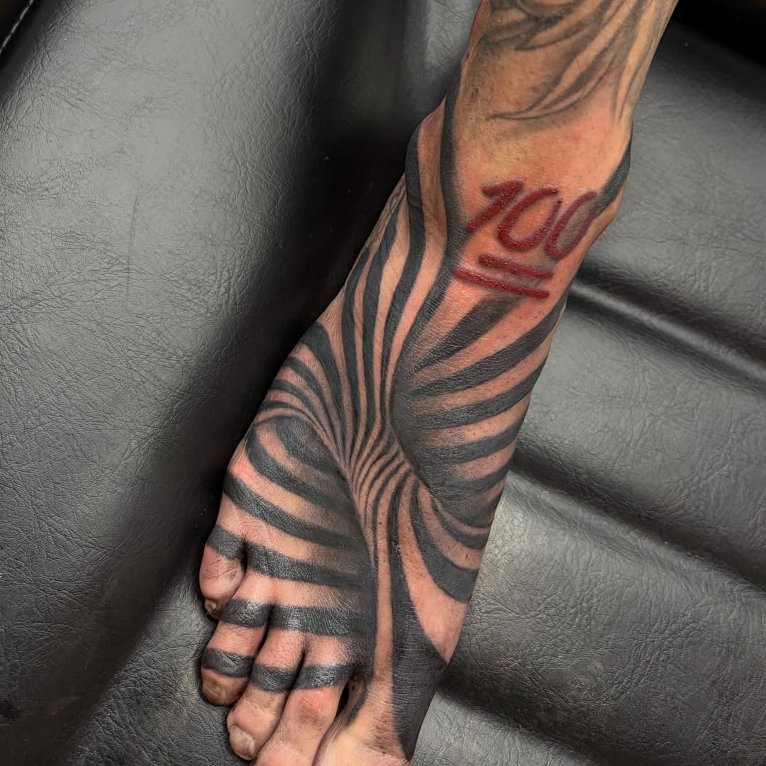 Stripes black and grey tattoo on the foot by Haley