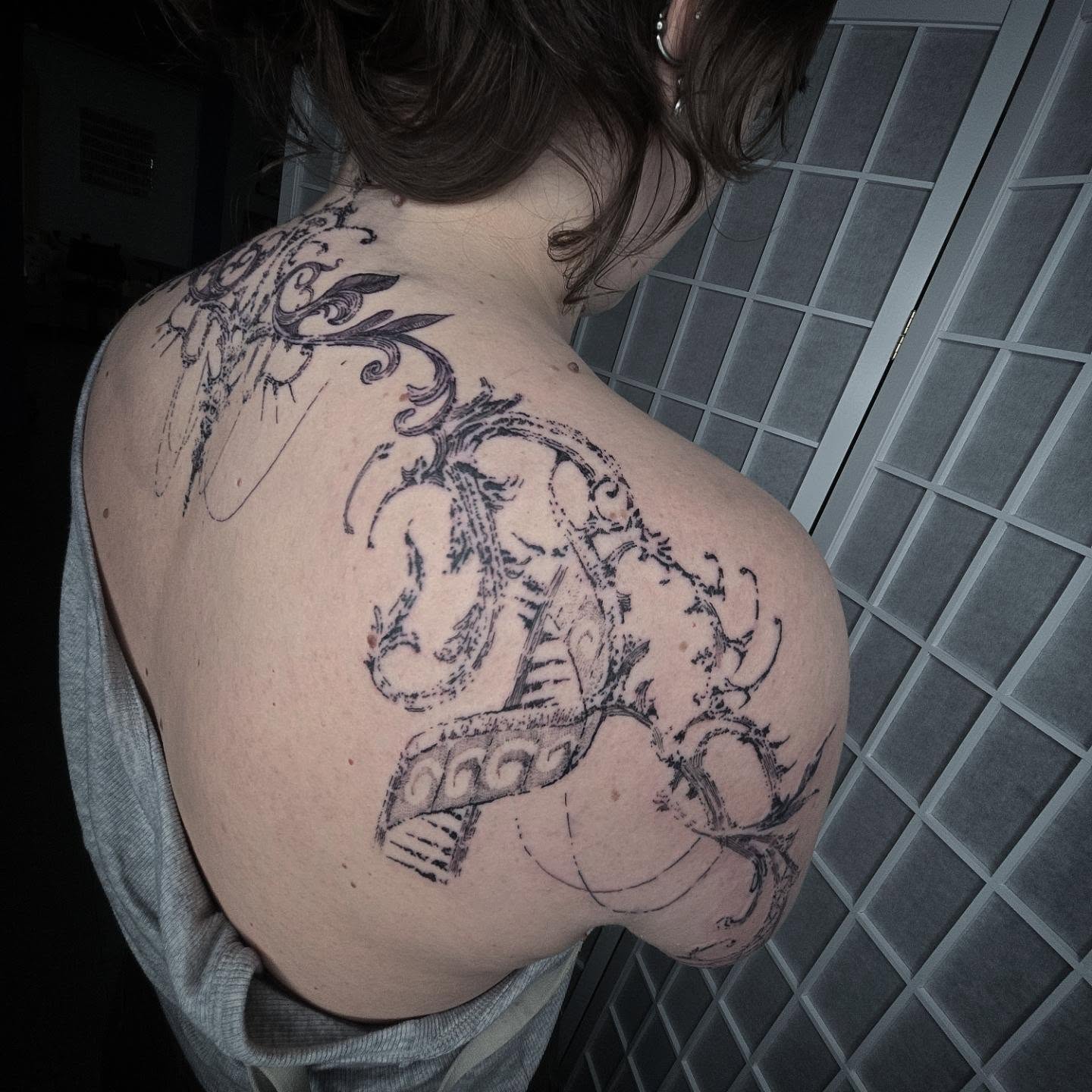 Dragon and shield black and grey tattoo on the back by ⚙️ 𝔄𝔞𝔯𝔬𝔫 𝔇. ⚙️