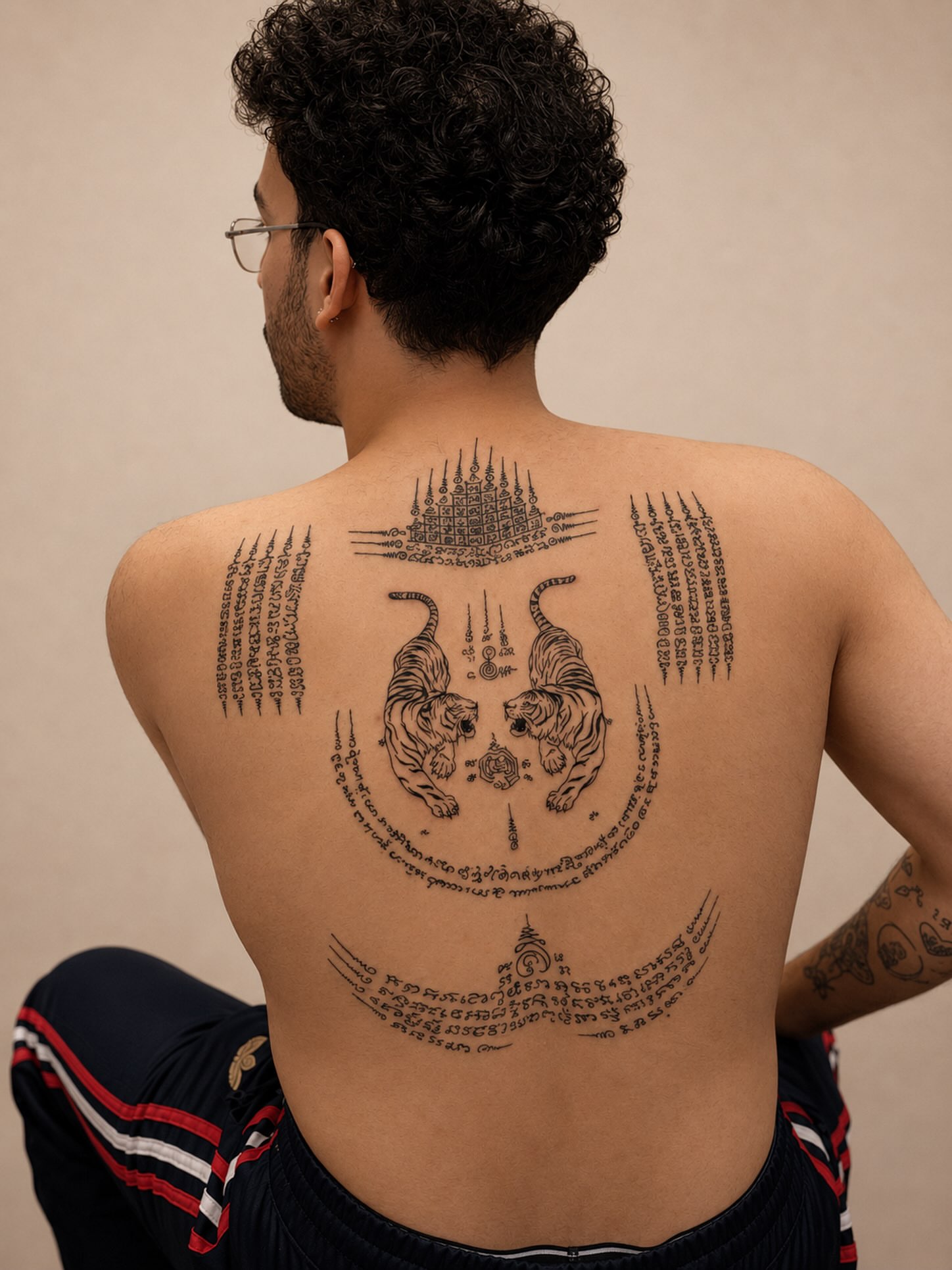 Tiger and temple black and grey tattoo on the back by Tiago Britto