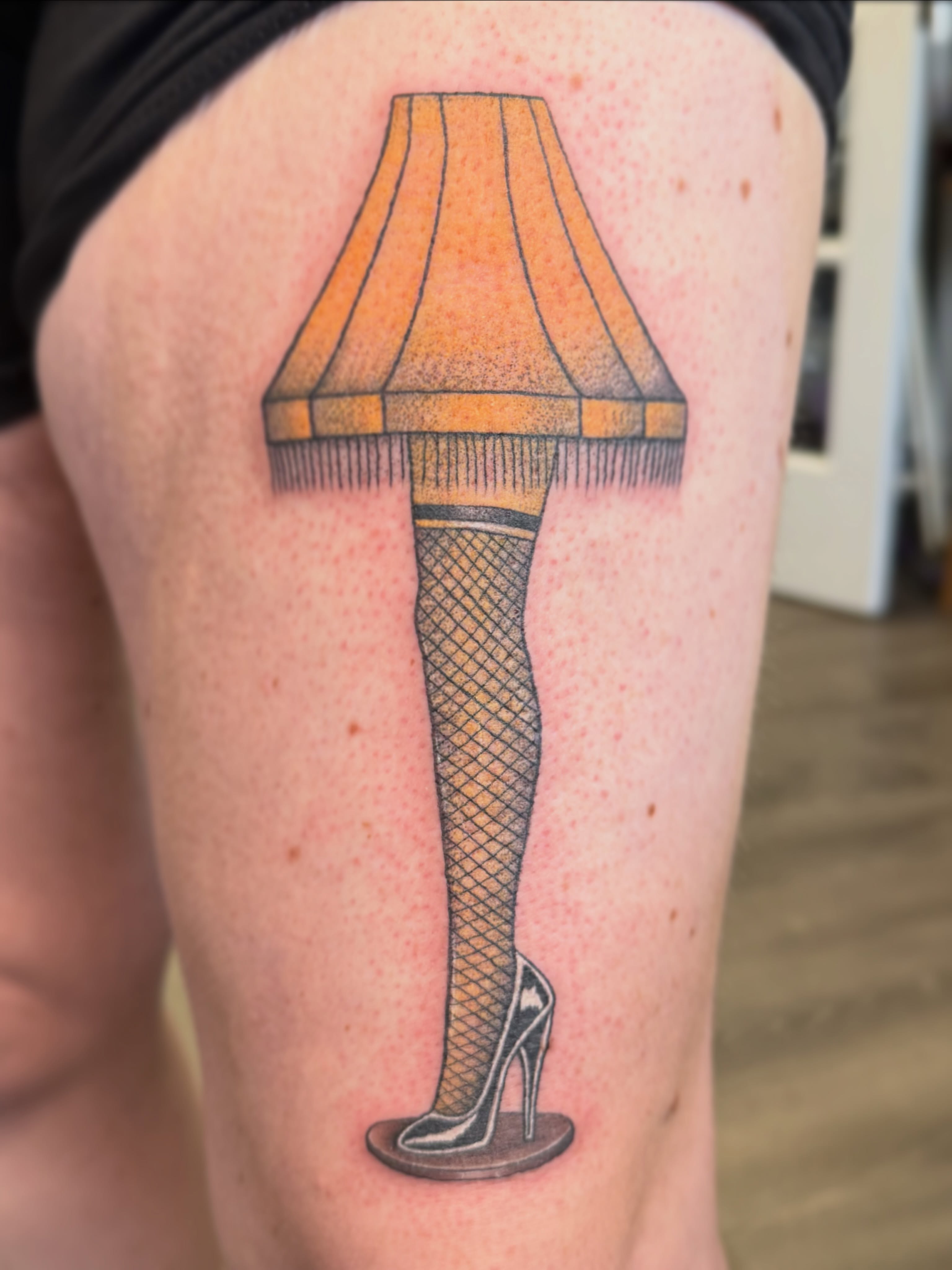 Lampshade dotwork tattoo on the thigh by Alexx Colombo