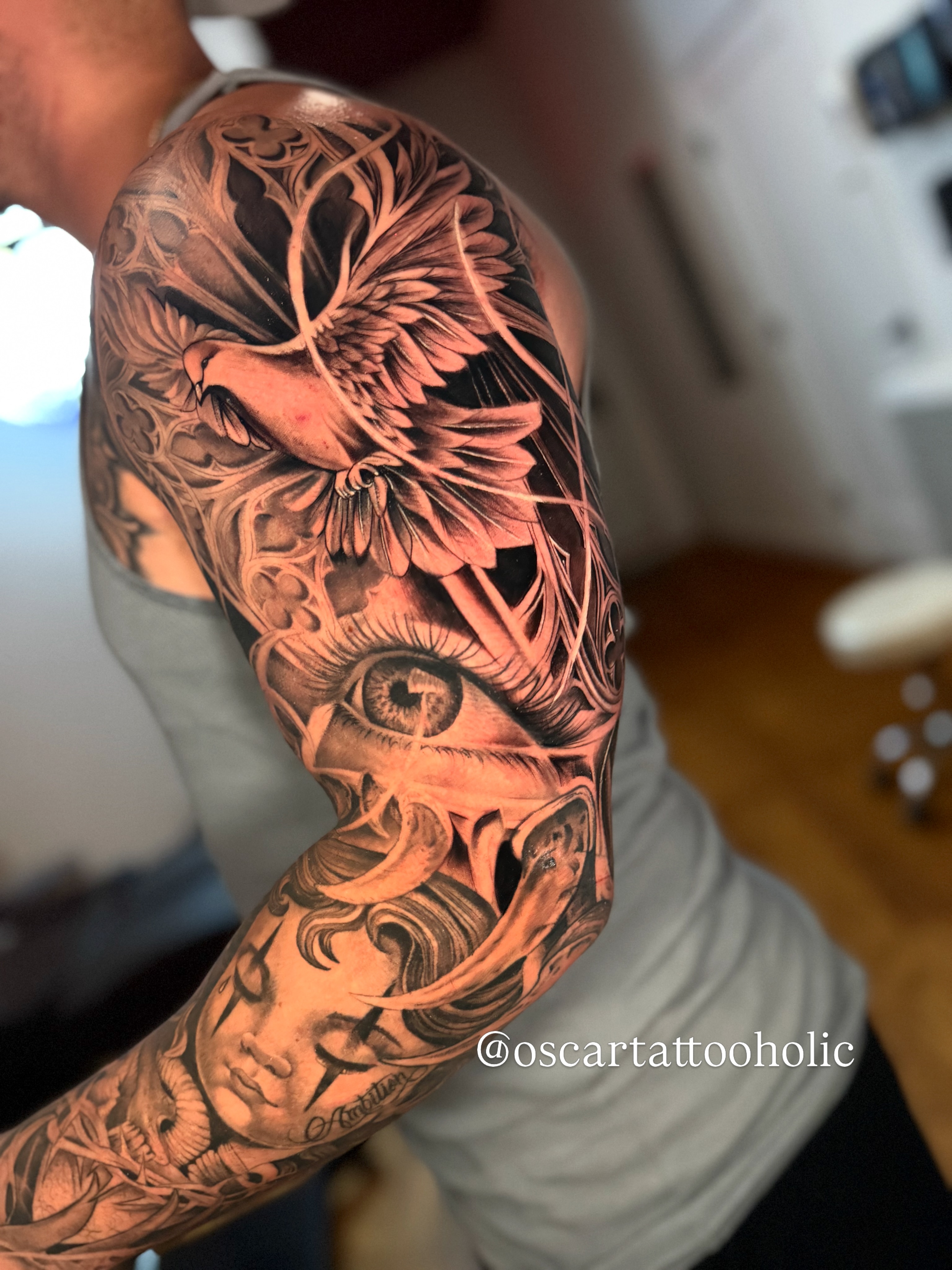 Tattoo by @oscartattooholic — realism, black_and_grey