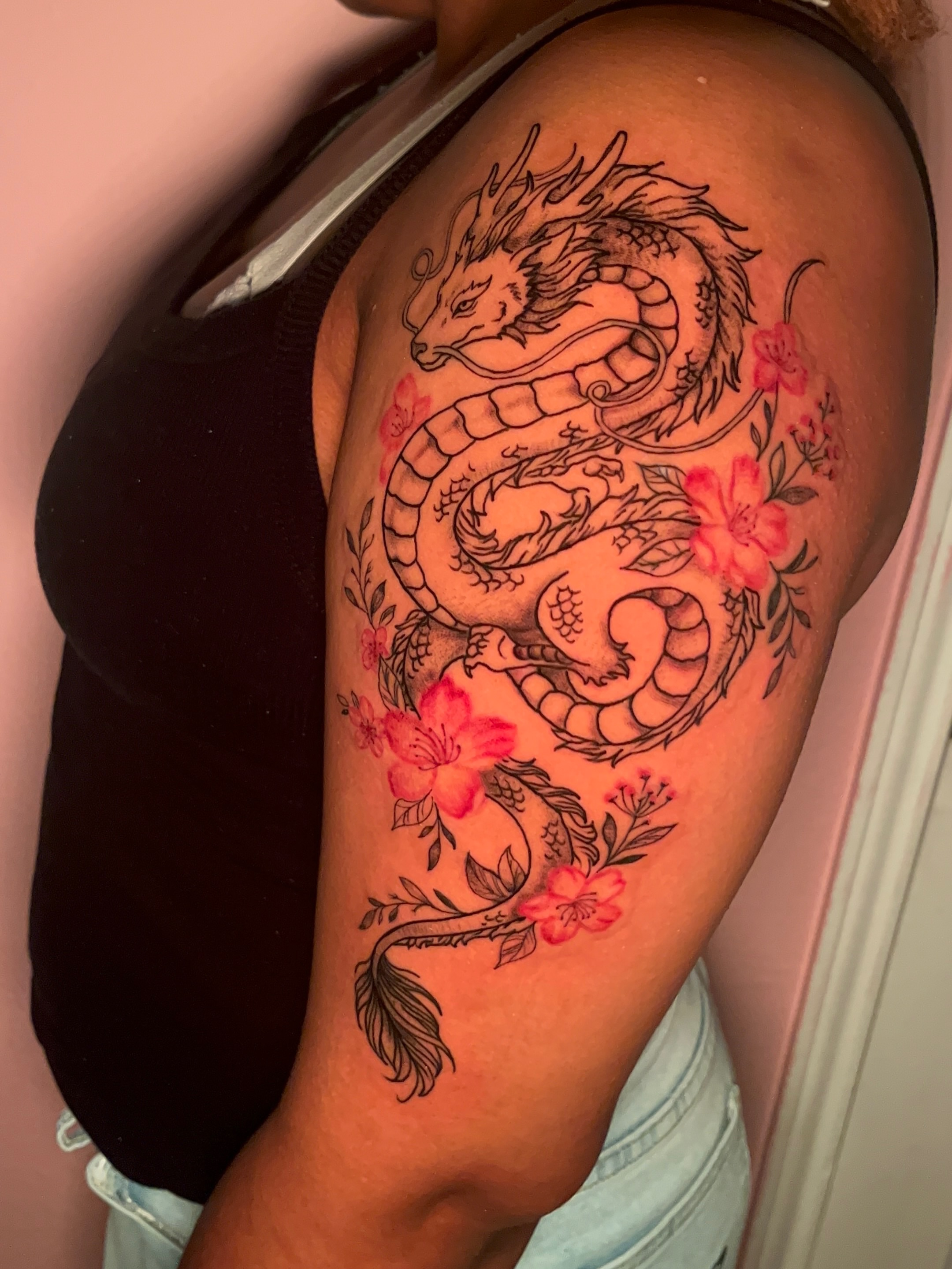 Dragon and cherry blossoms japanese irezumi tattoo on the shoulder by The inspo