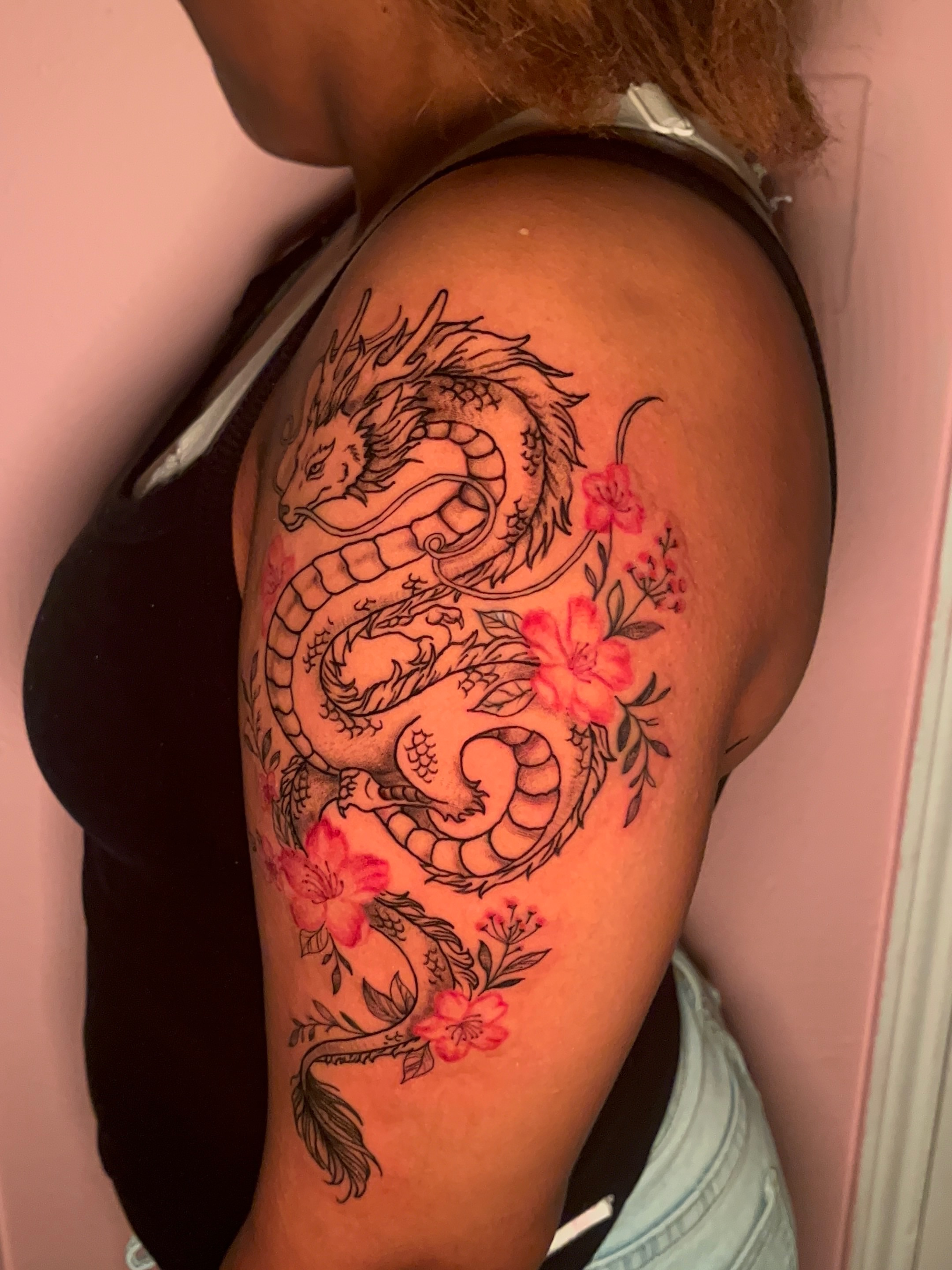 Dragon and flowers japanese irezumi tattoo on the shoulder by The inspo