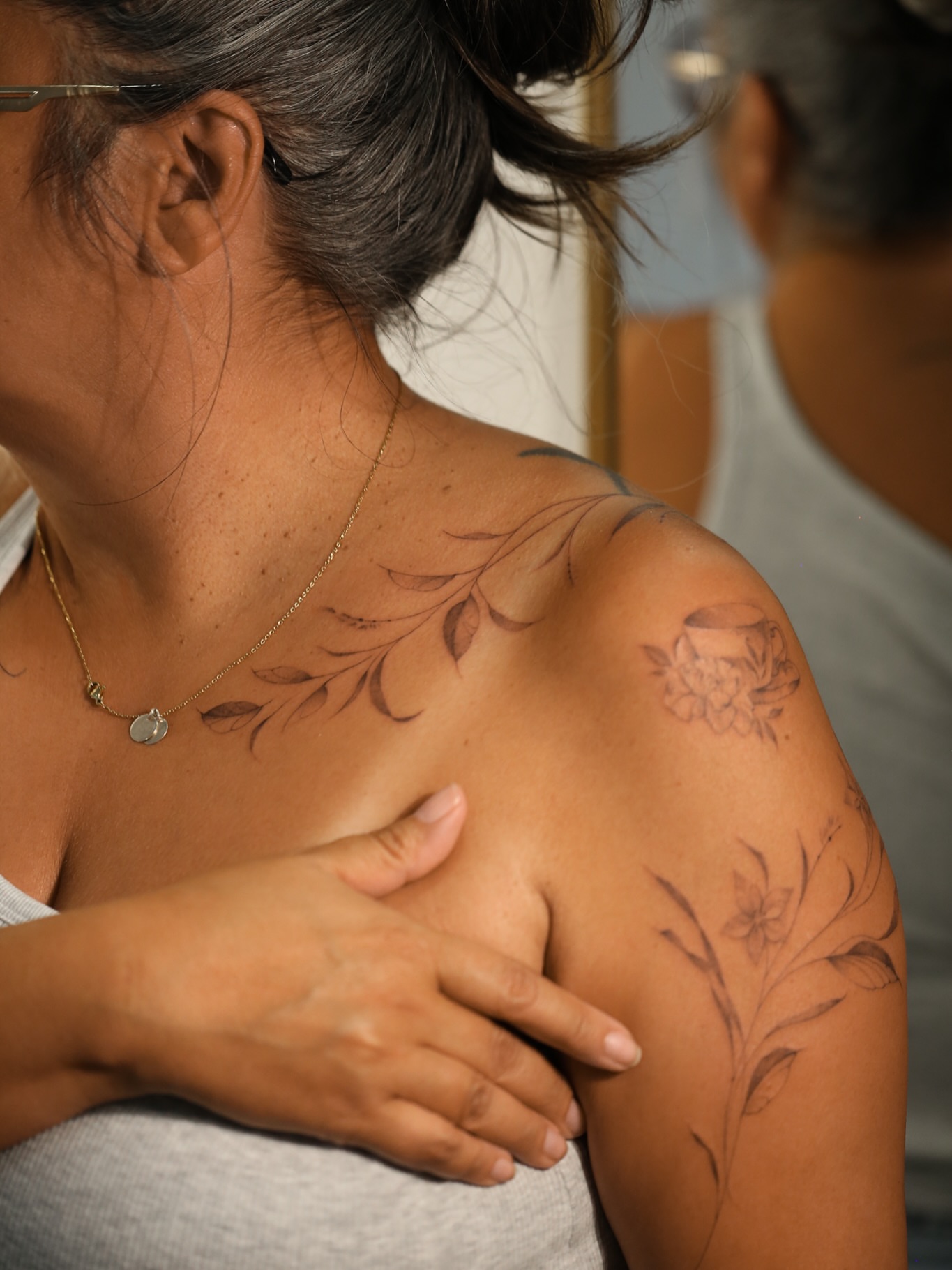 Floral vine black and grey tattoo on the shoulder by Inna Petrova, Kitchener, Ontario