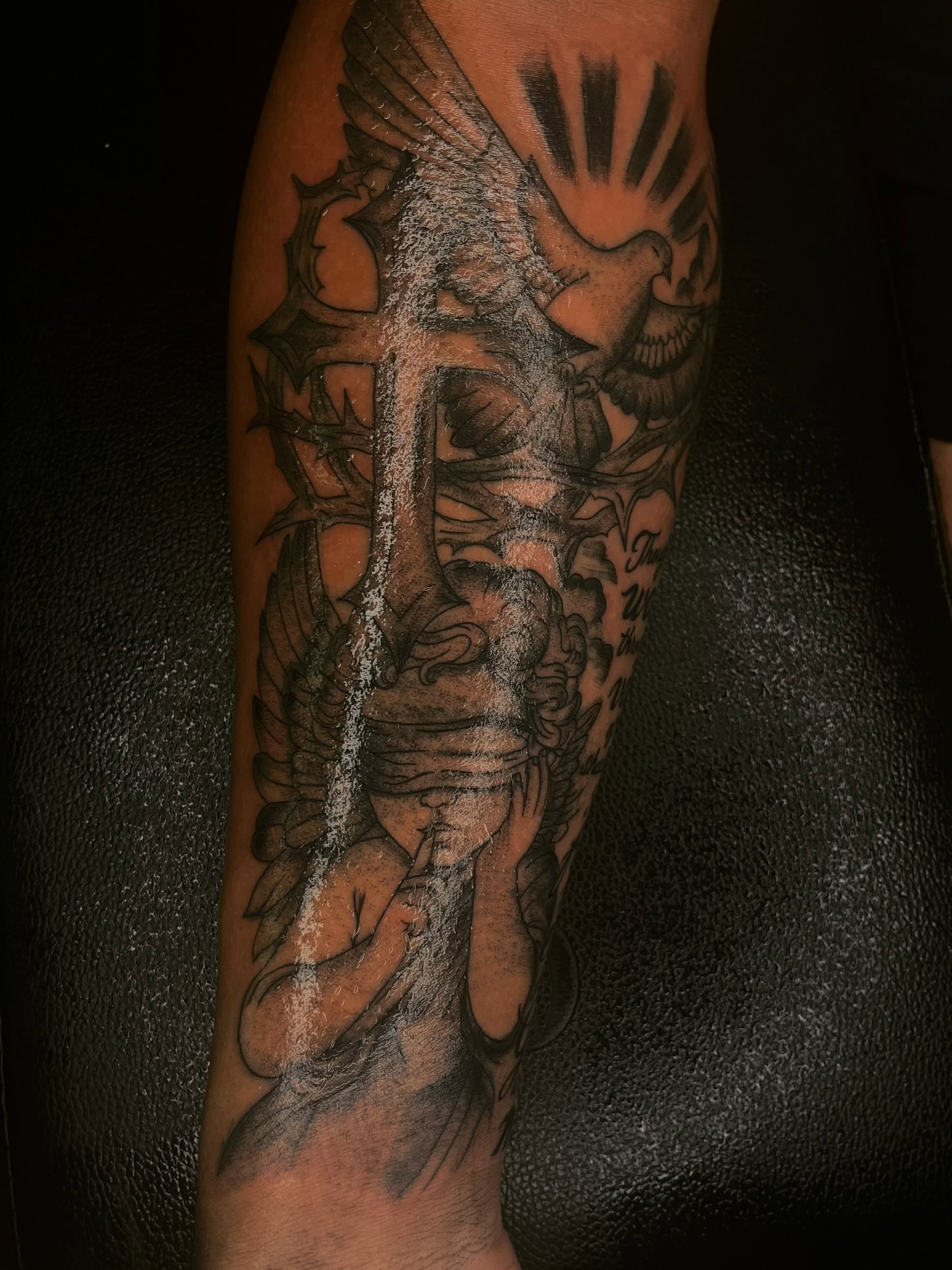 Blindfolded figure with dove realism tattoo on the forearm by ɪɪɴᴋᴇᴅʙʏʀᴇɴɴ🐉