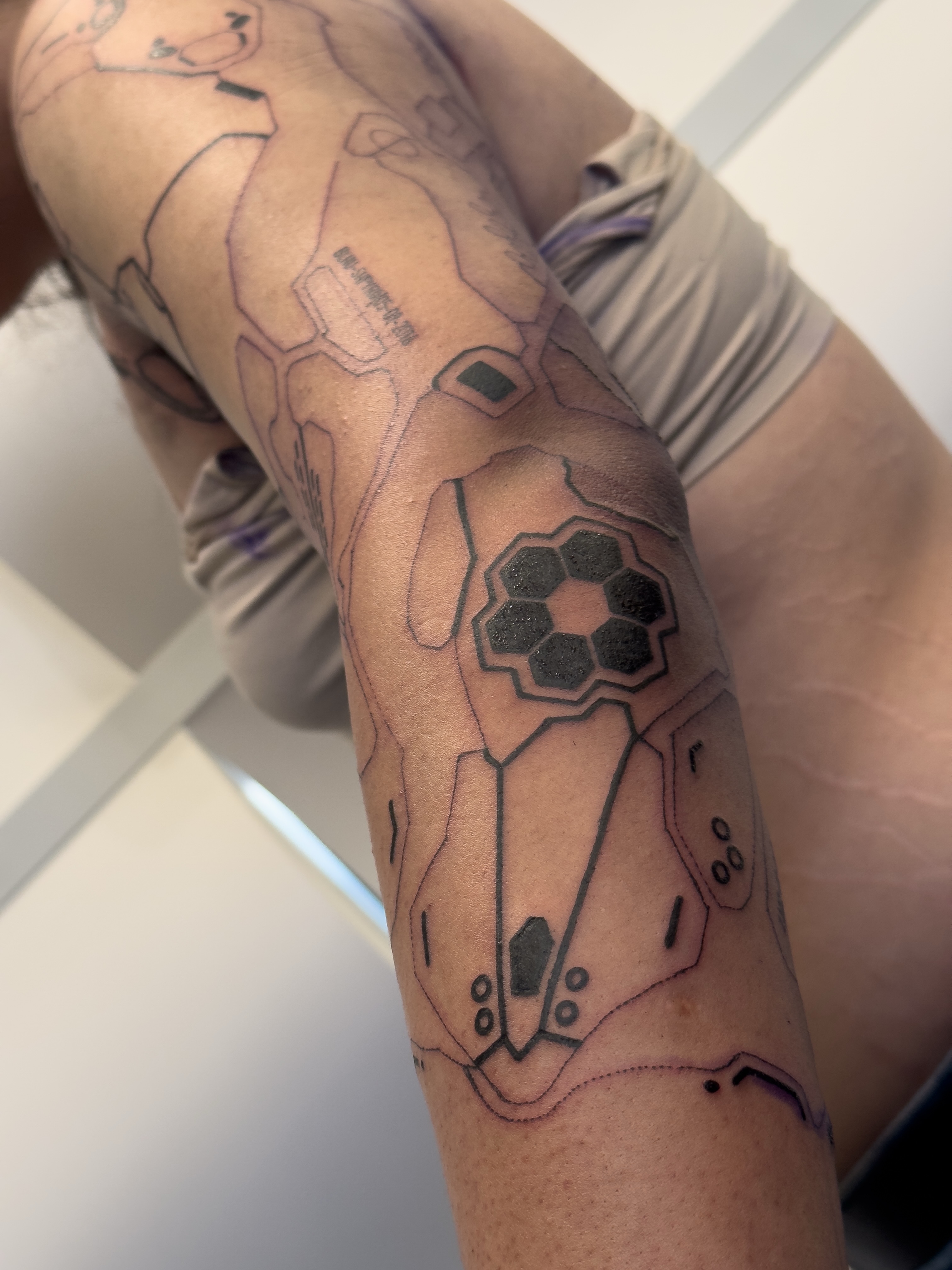 Geometric design geometric tattoo on the forearm by Josaline Green