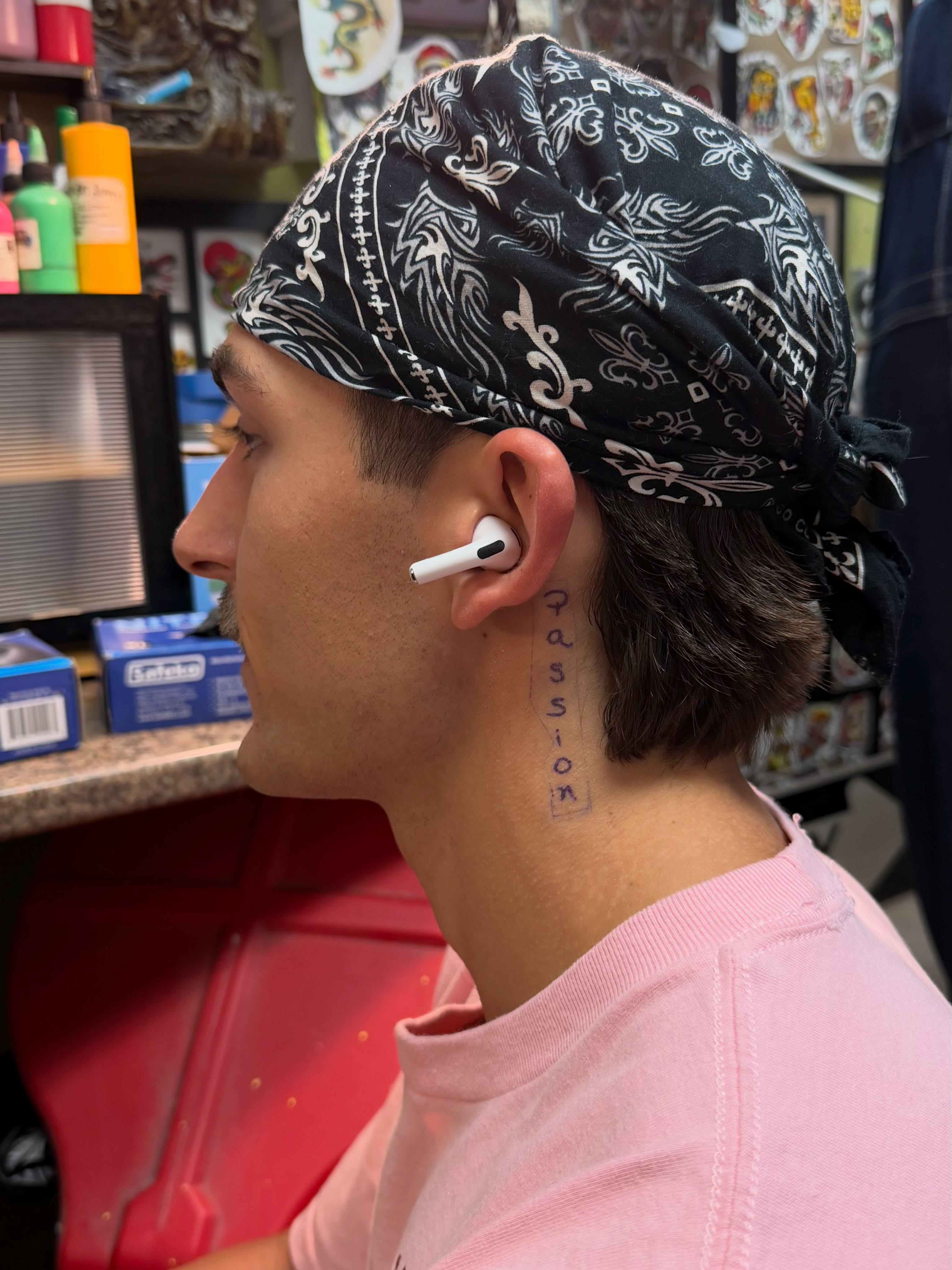 Passion lettering script tattoo on the neck by World Famous Big Bob, Blackwood, New Jersey