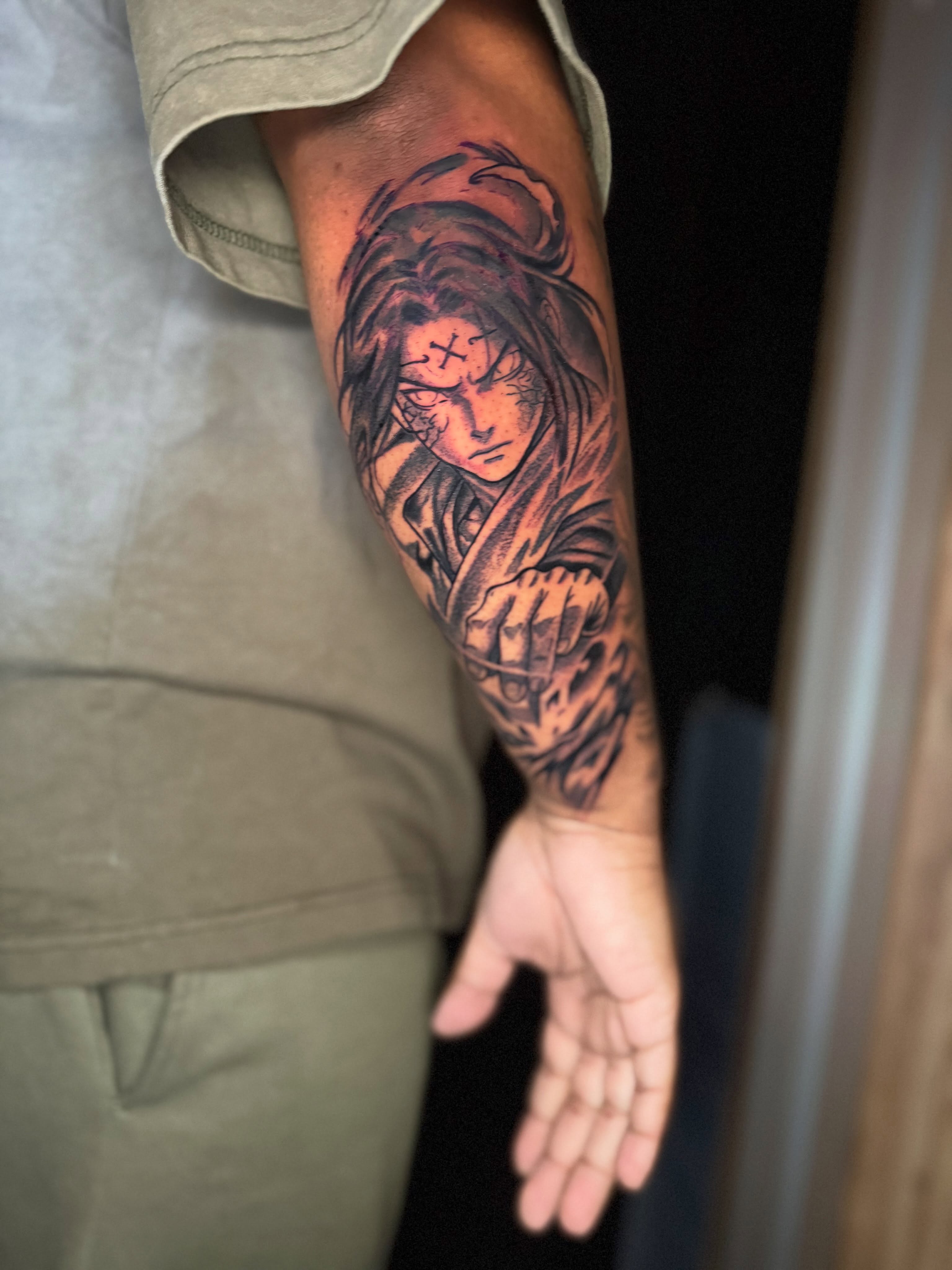 Anime character anime tattoo on the forearm by Anime Tattoo Columbus