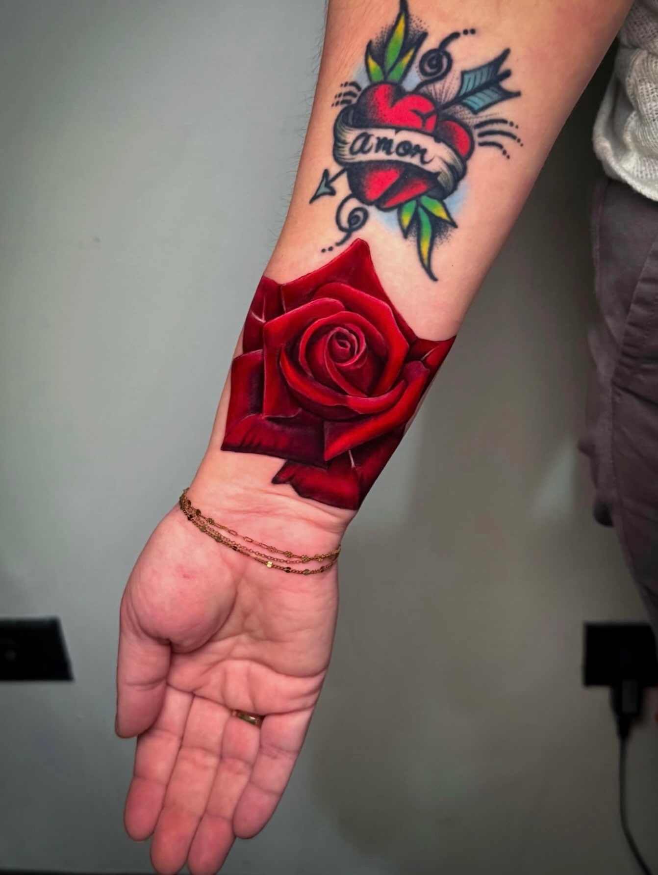Red rose realism tattoo on the forearm by 𝕀𝕣𝕚𝕤 𝔸𝕣𝕖𝕝𝕝𝕒𝕟𝕠