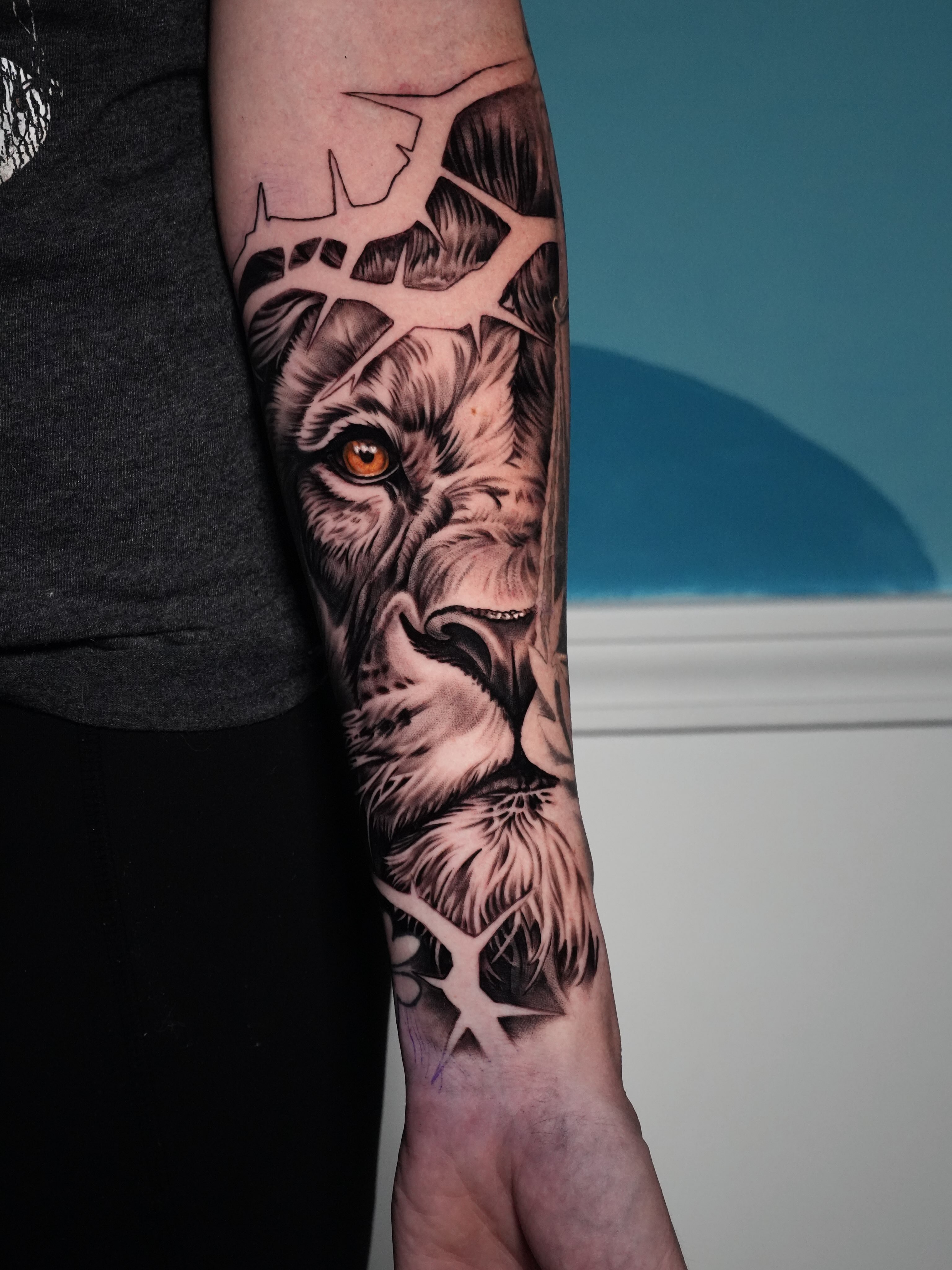 Tattoo by @aqua.ink_joe — realism, black_and_grey