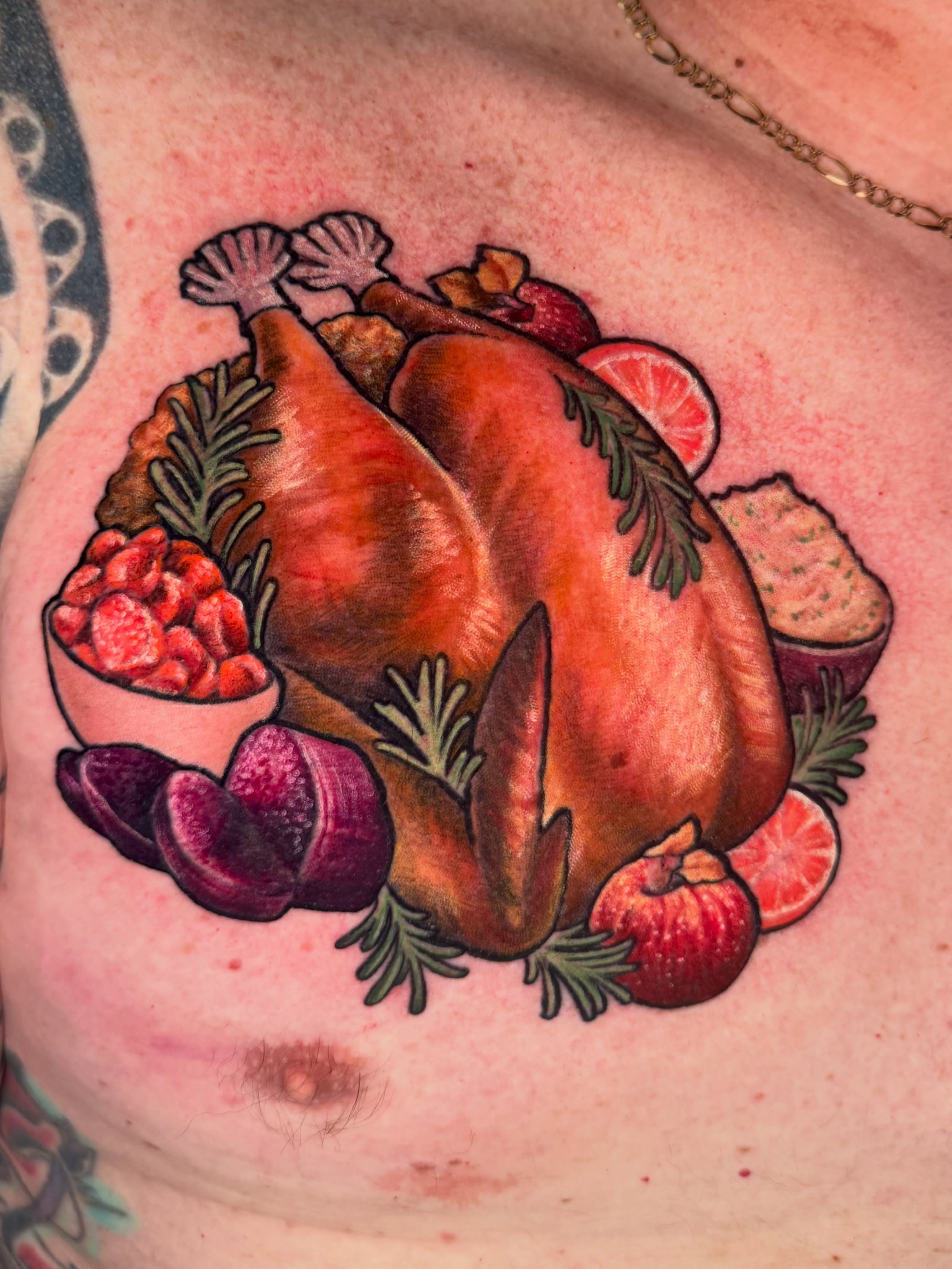 Roasted turkey realism tattoo on the chest by Missi Blue