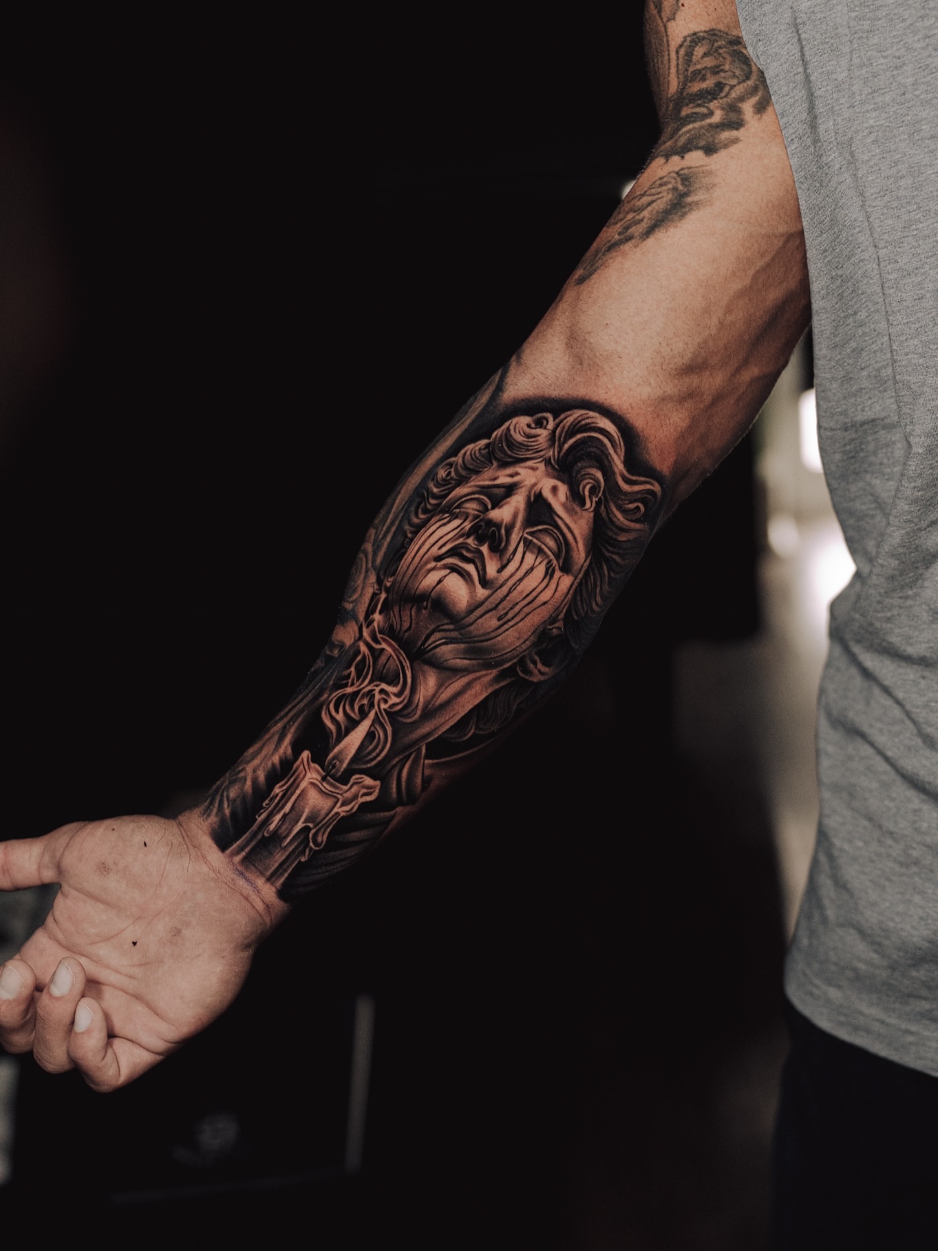 God-like figure realism tattoo on the forearm by Ray Paponetti - Tattoo Artist Delray Beach