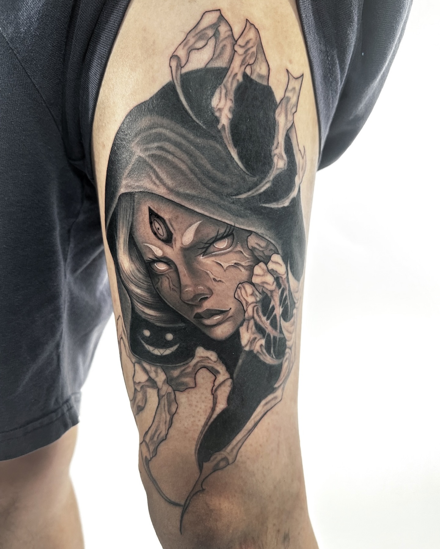Woman with hood dark realism tattoo on the forearm by Jason