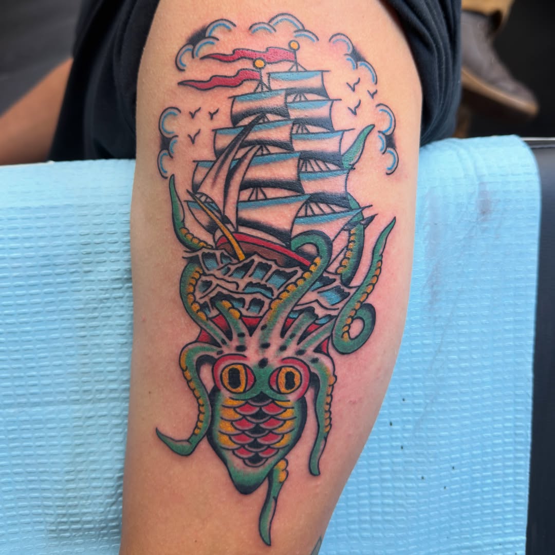 Ship and octopus American traditional tattoo on the forearm by Carl Testi