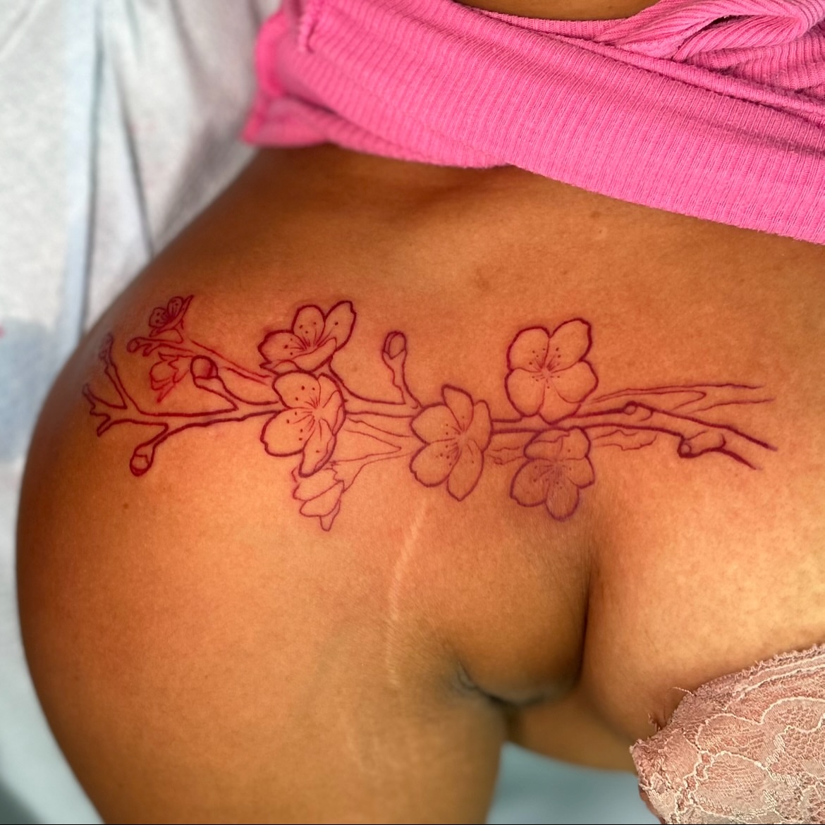 Cherry blossoms dotwork tattoo on the back by Maara Martinez