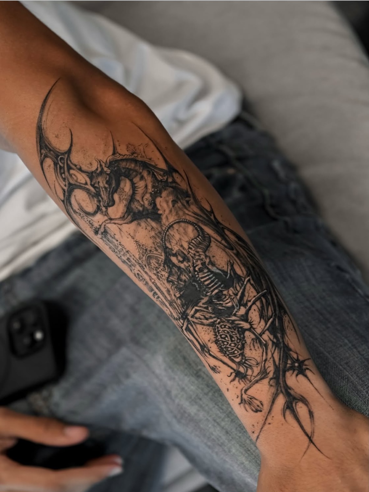 Mythical creature realism tattoo on the forearm by Kimi
