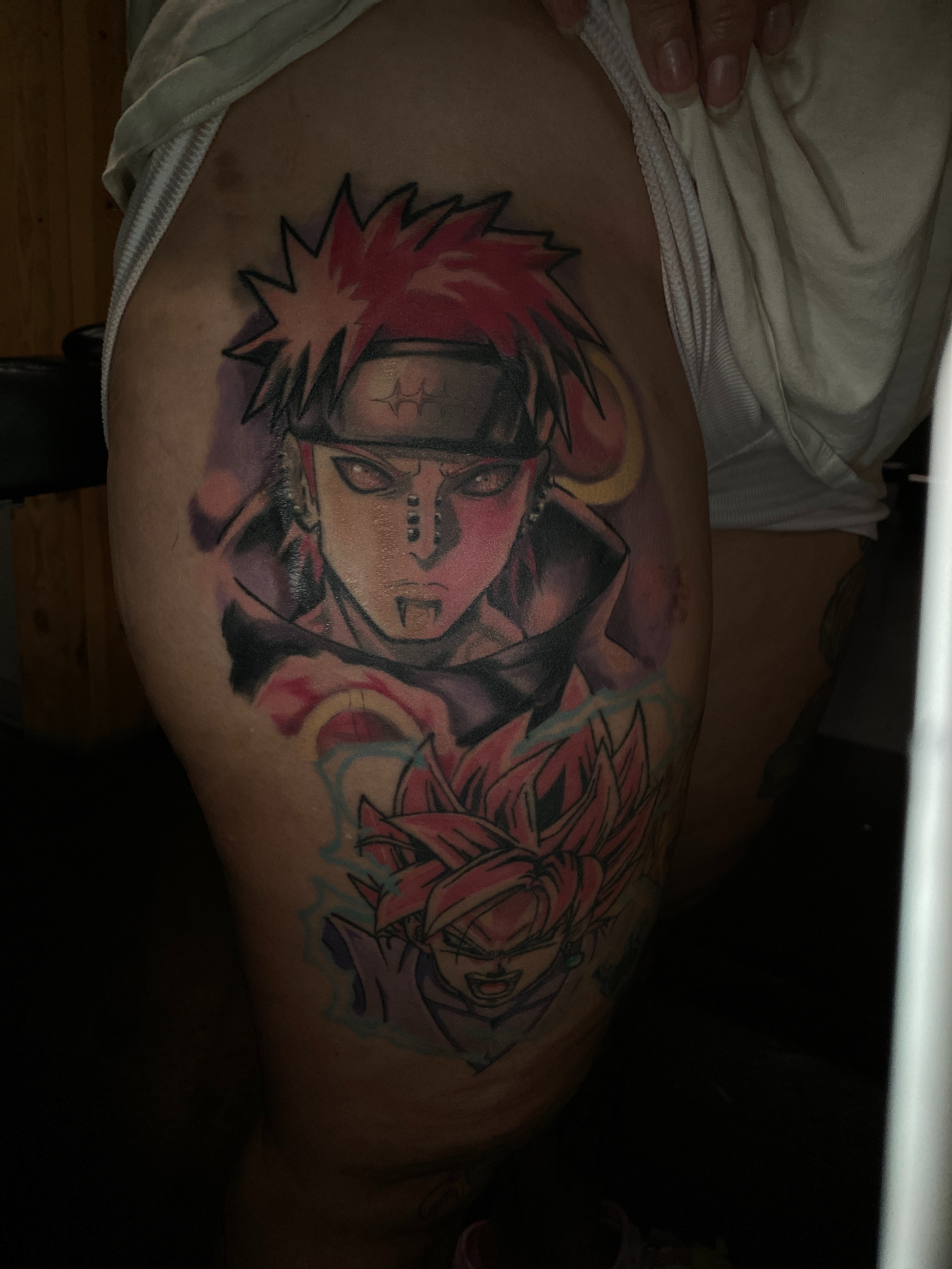 Anime characters anime tattoo on the thigh by Kyle The Cartoon Guy