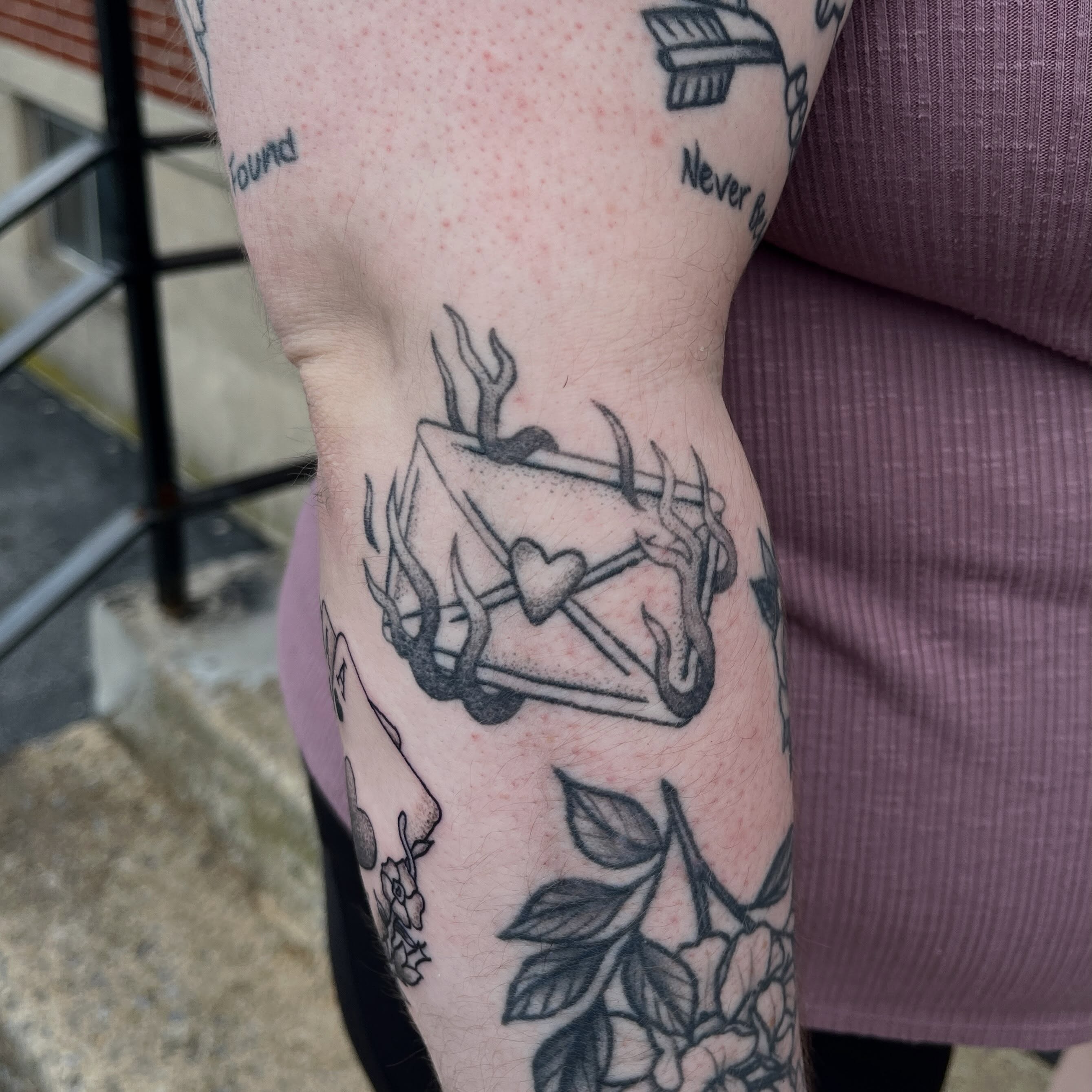 Box with heart black and grey tattoo on the forearm by sarah