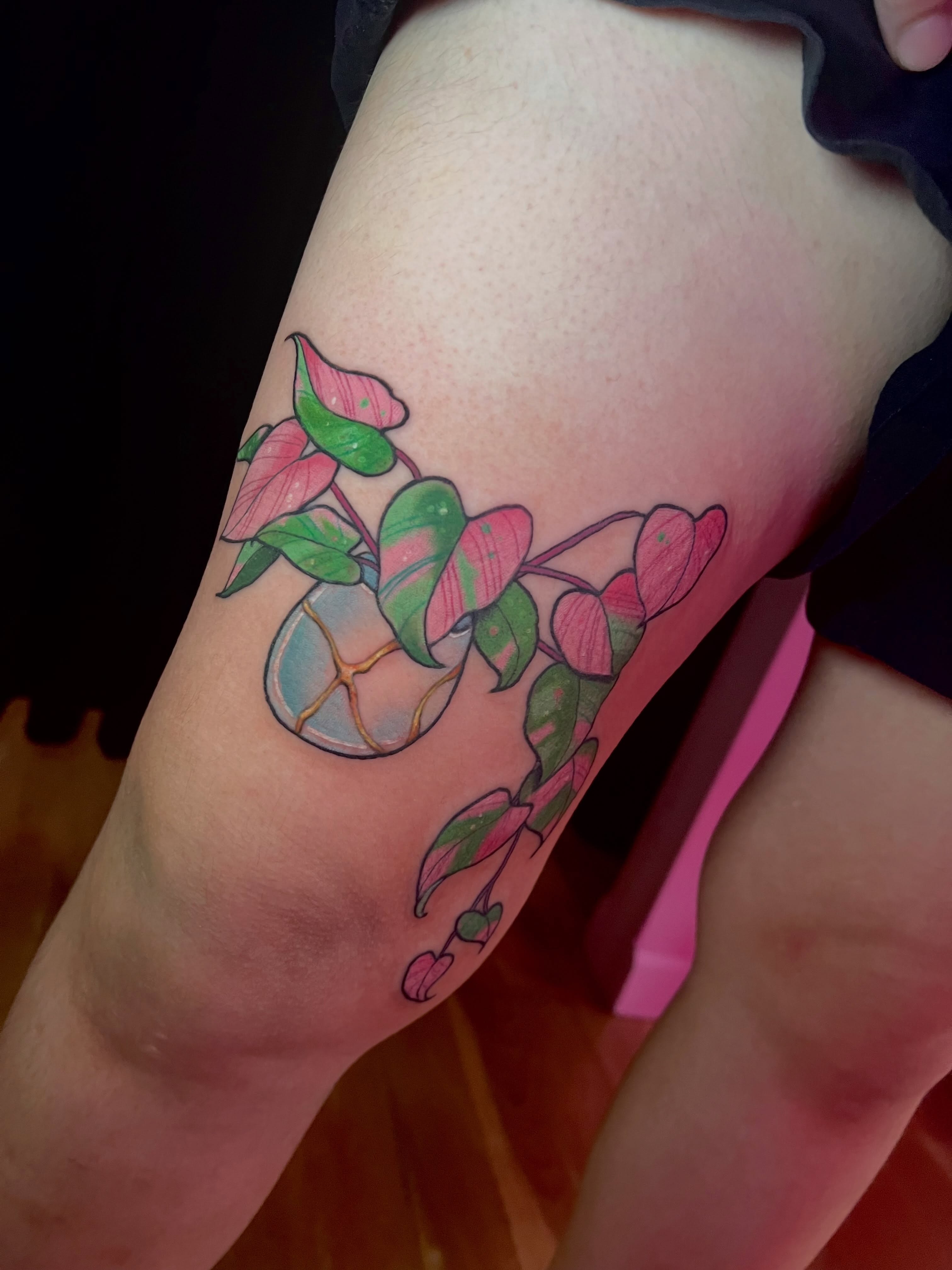 Plant with berries new school tattoo on the thigh by jessica valentine