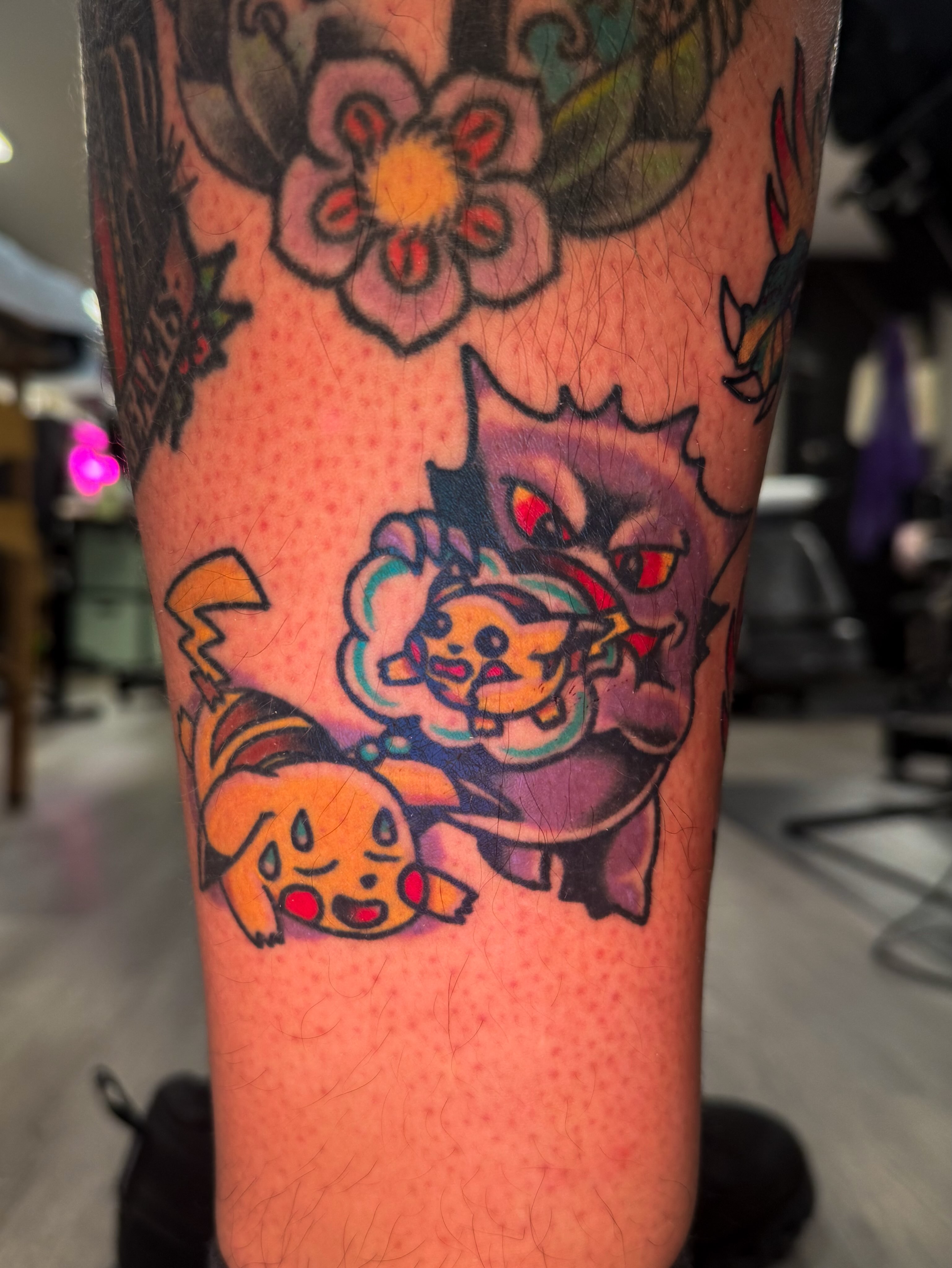 Pikachu and Ditto dotwork tattoo on the forearm by Louie Flores