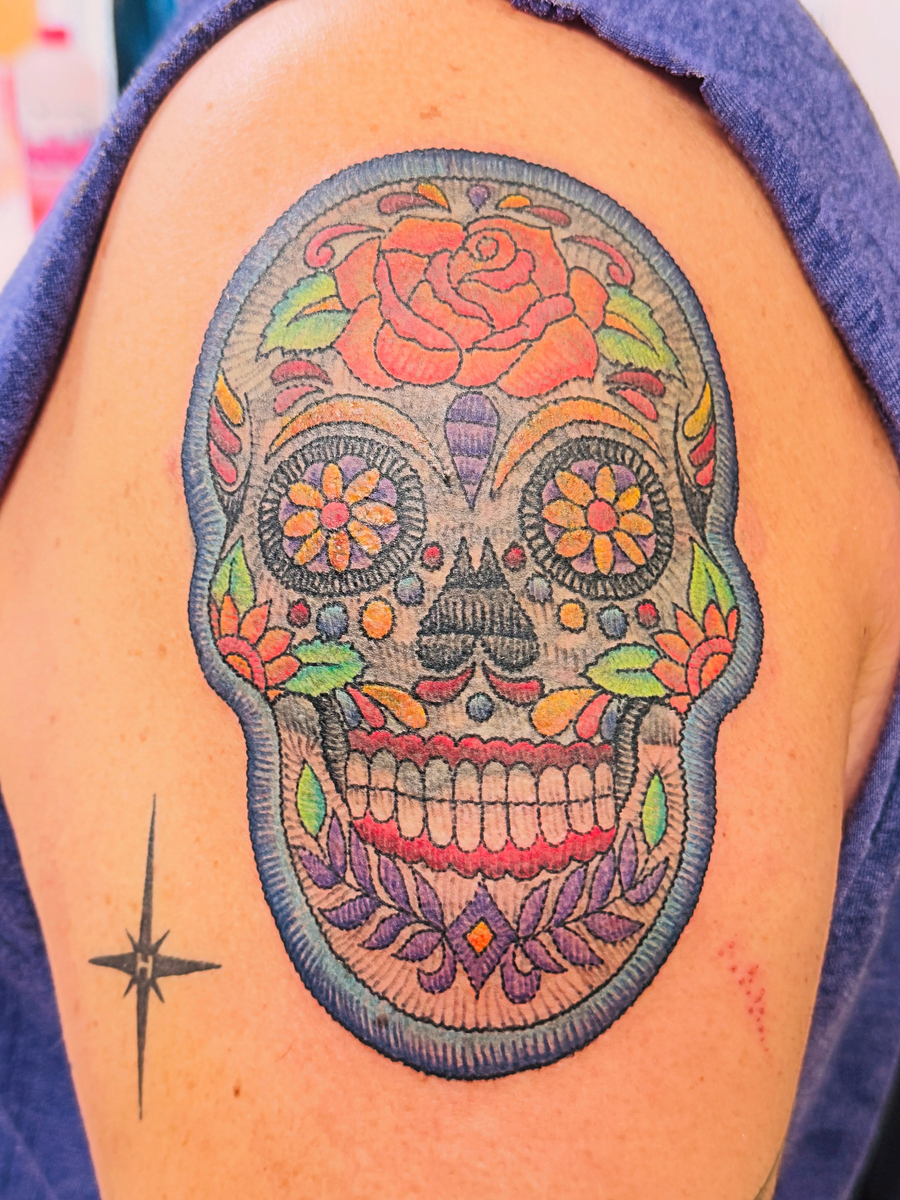 Sugar skull Chicano tattoo on the shoulder by Cristal Bidoul