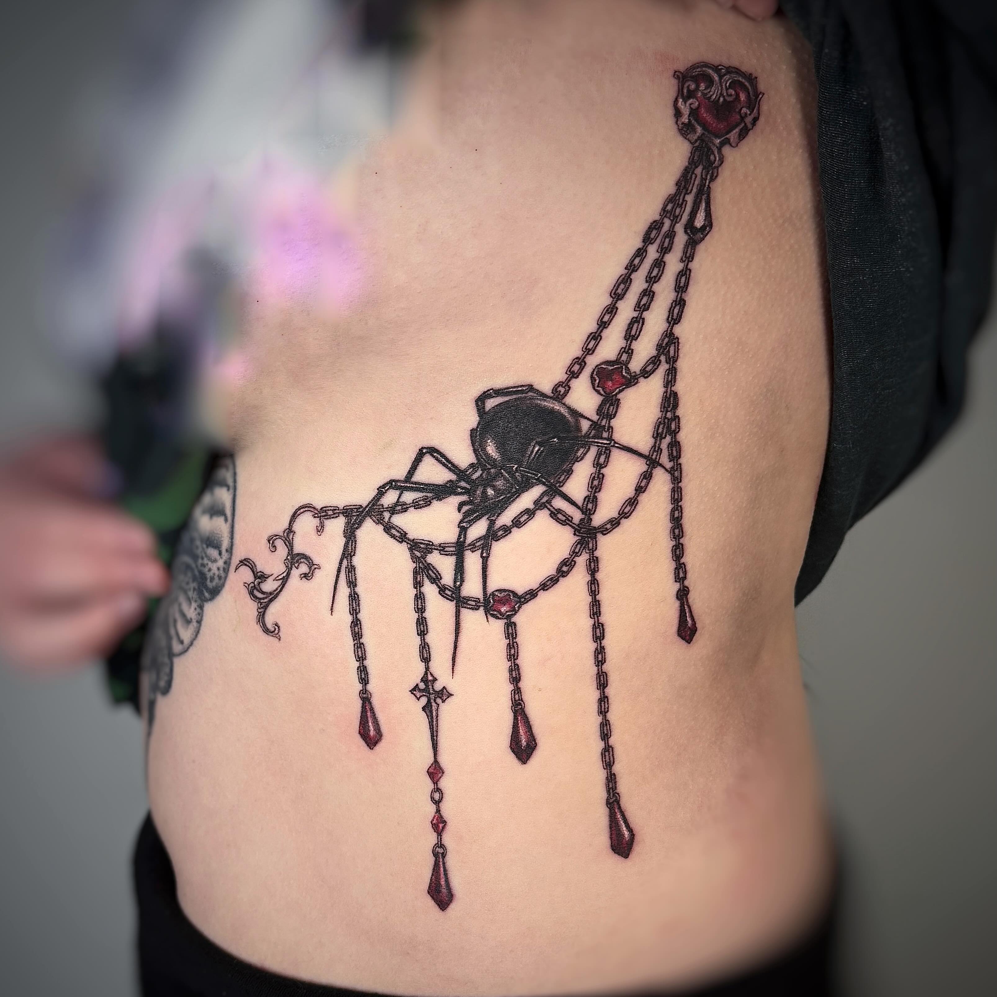 Spider and chains black and grey tattoo on the ribs by Jemin Ren
