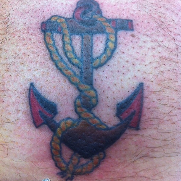 Anchor with rope American traditional tattoo on the chest by Kielin Green